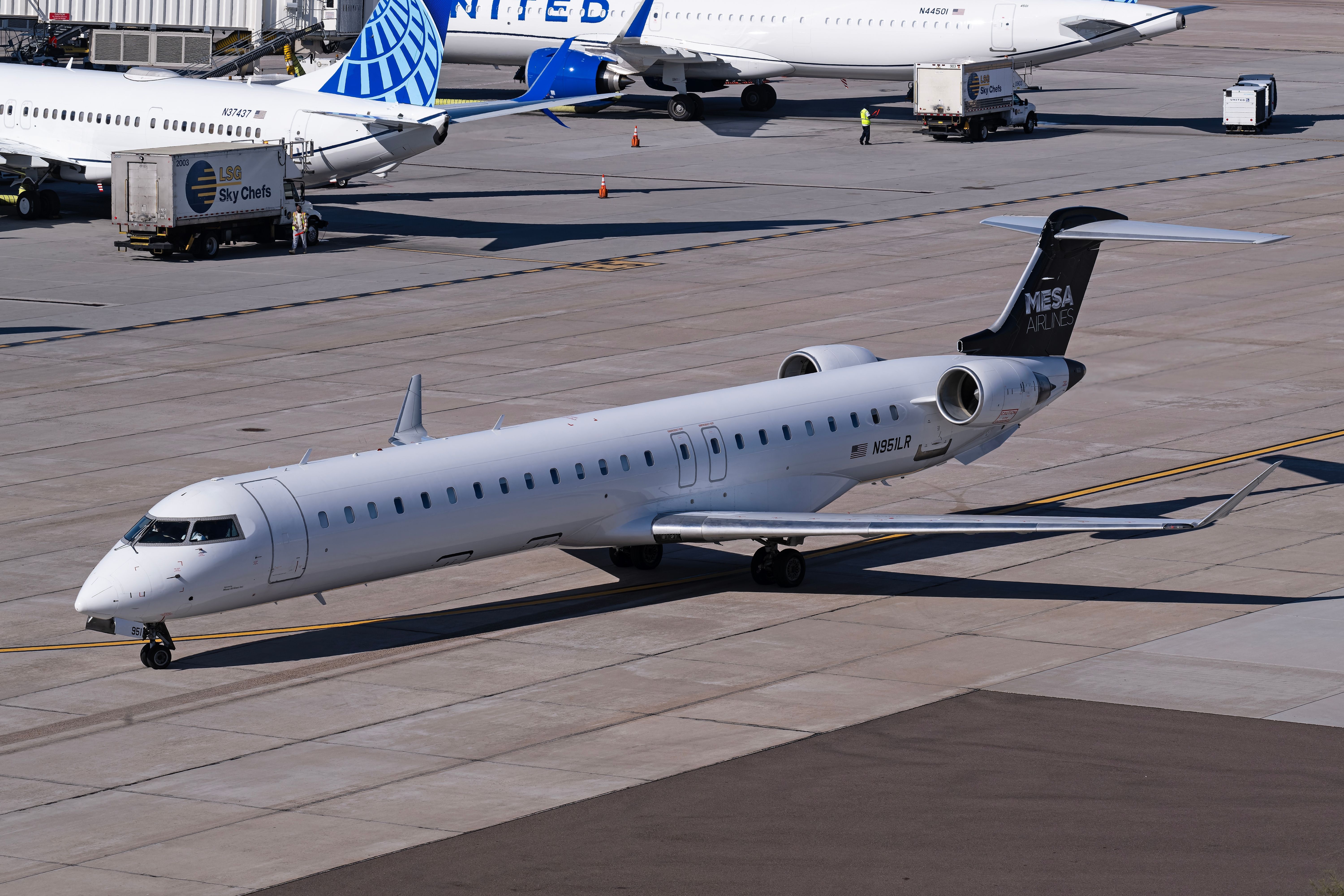 Mesa Airlines Bombardier CRJ-900 (N951LR) headed for the Terminal 3 E gates at Phoenix Sky Harbor International Airport - December 2, 2023.