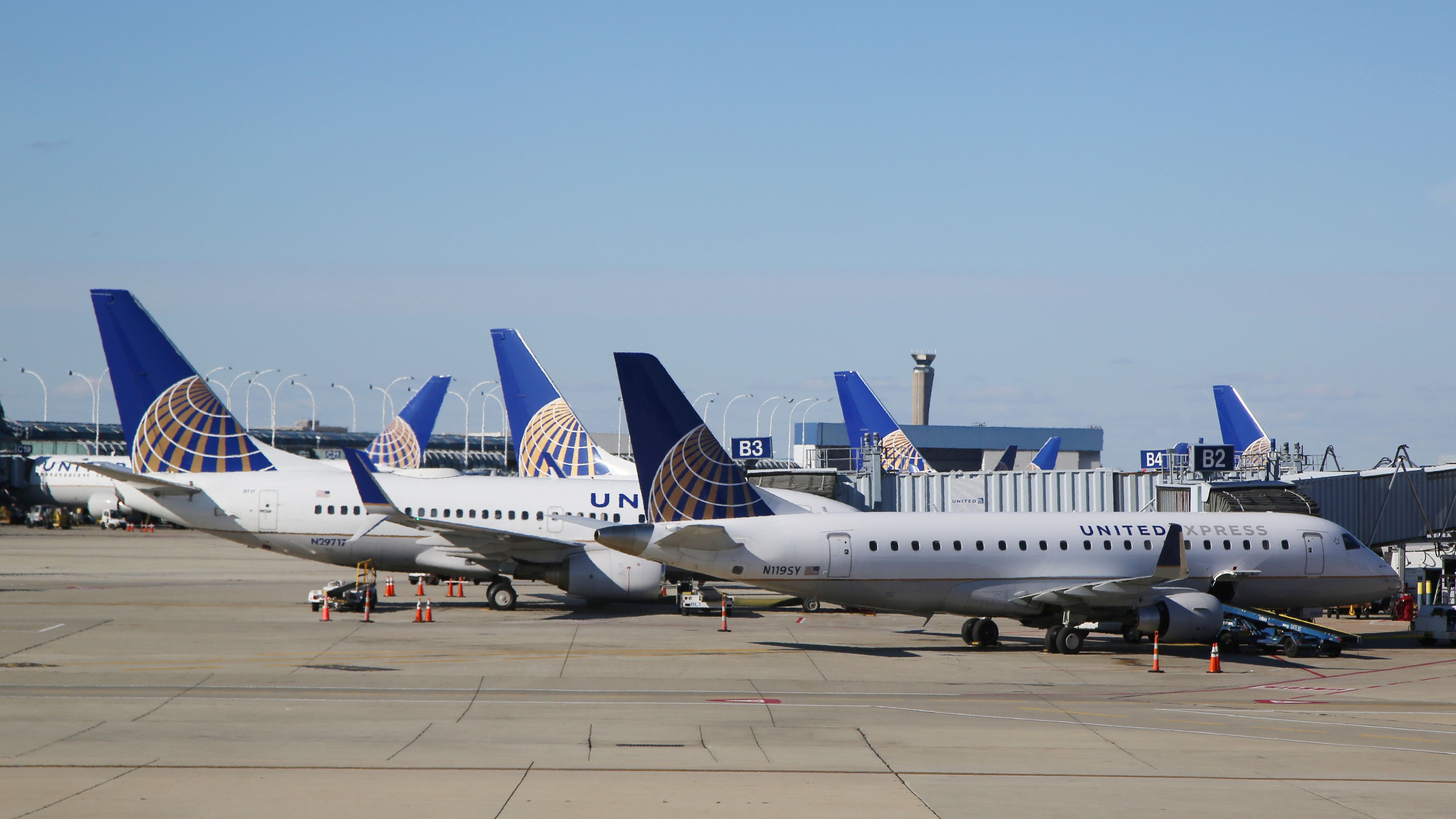 Multiple United Airlines Aircraft parked on an airport apron.