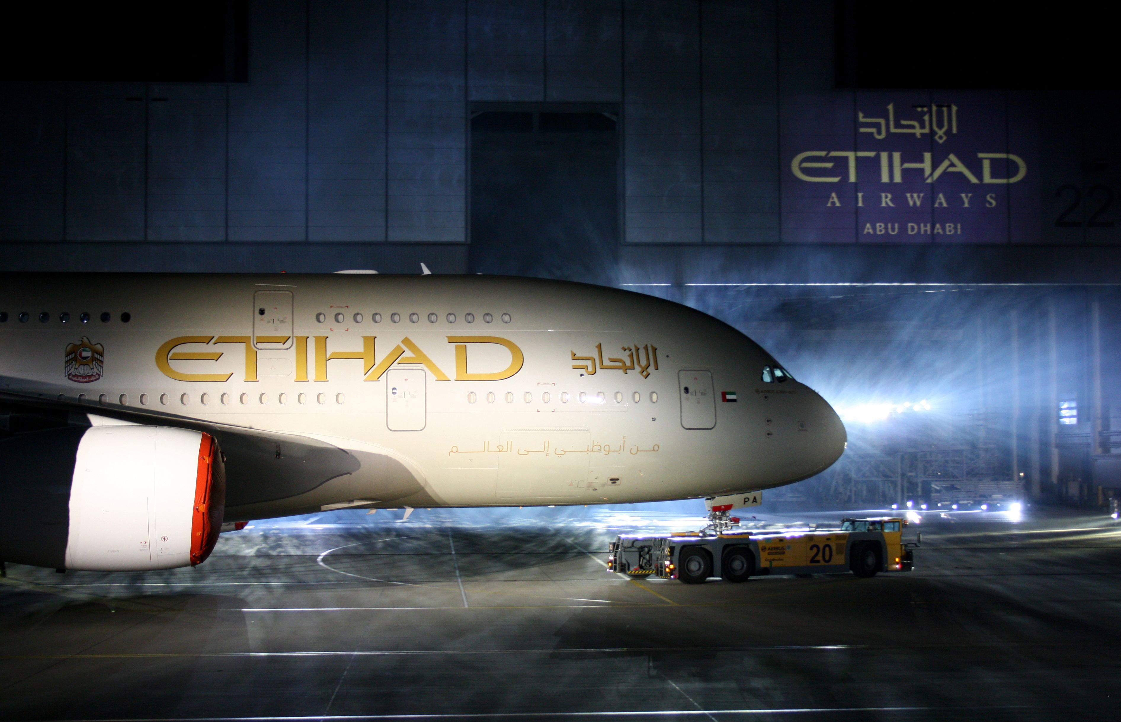 An Etihad Airbus A380 parked at an airport