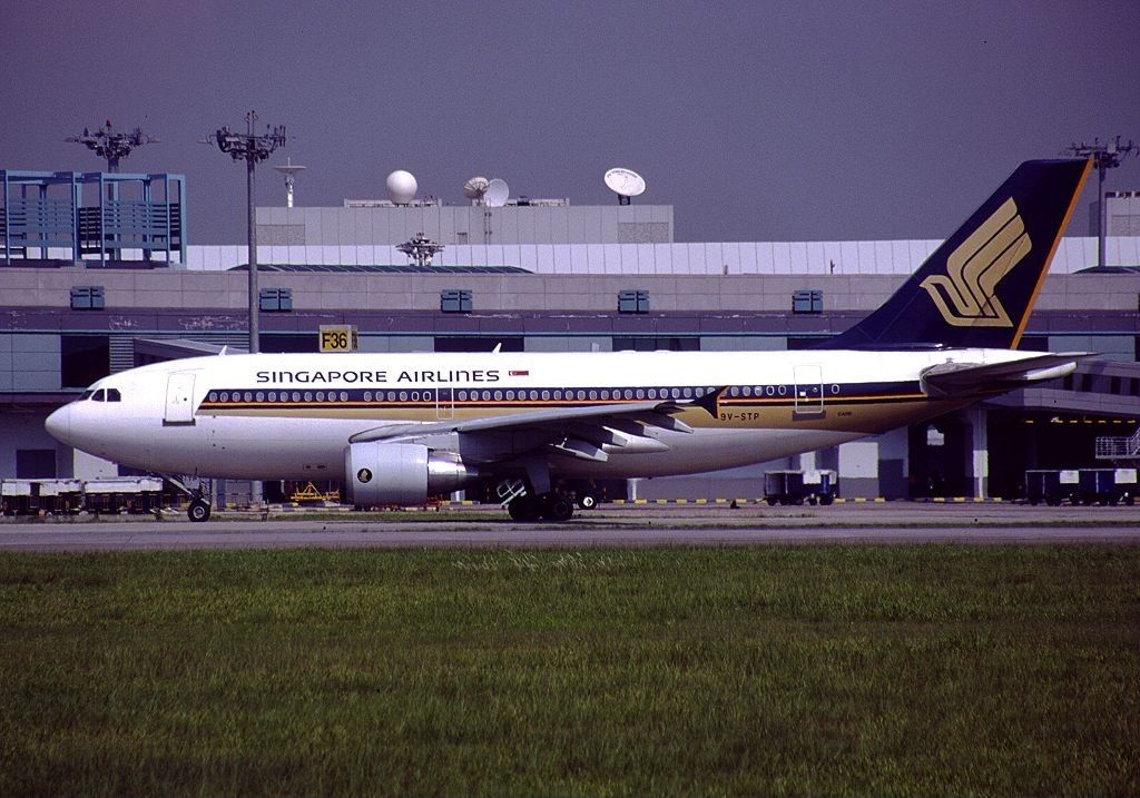 A Singapore Airlines Airbus A310 on an airport apron.
