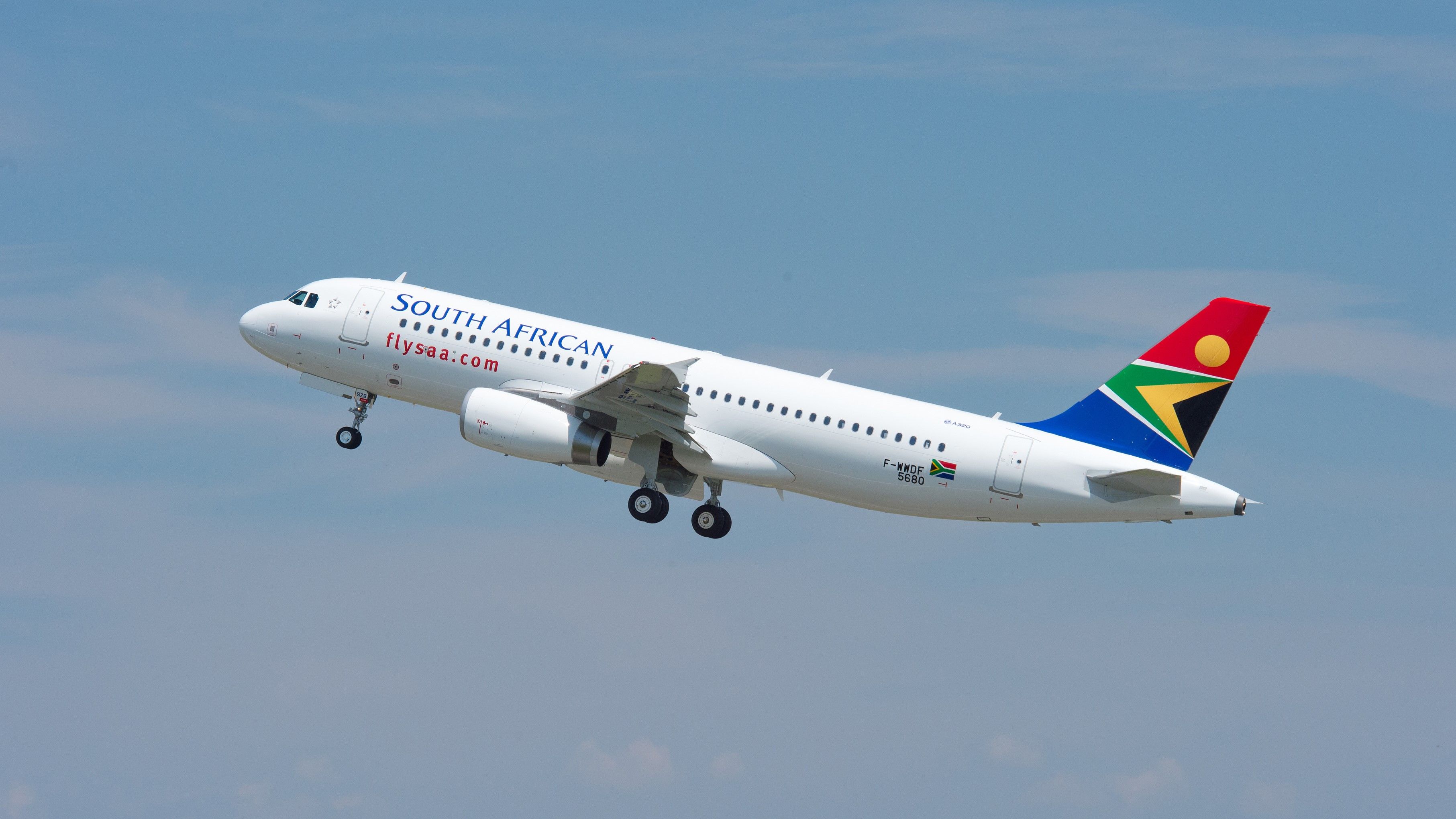 A South African Airways Airbus A320 Flying in the sky.