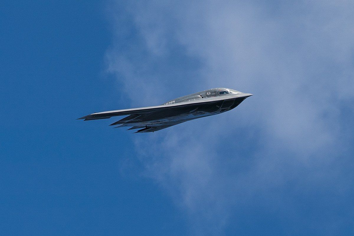 A Closeup of the B2 Bomber turning in the sky.