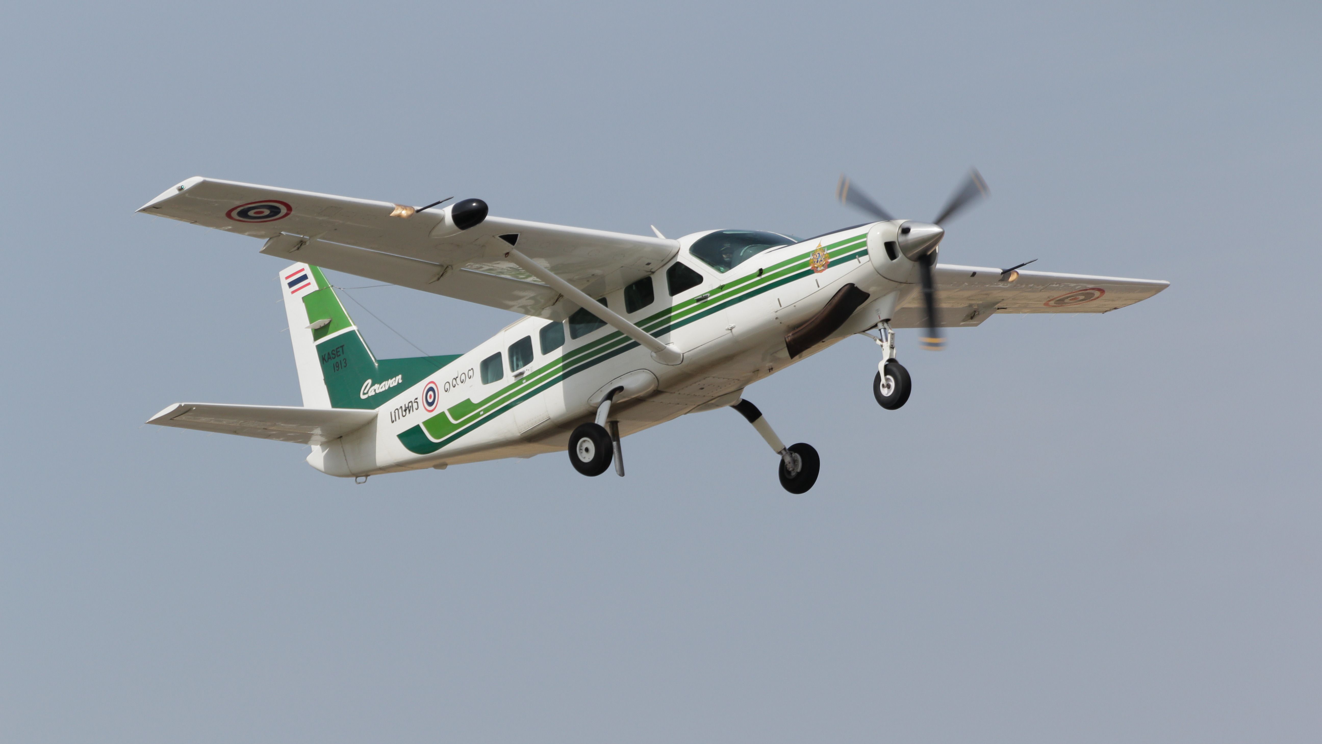 A Cessna 208 Caravan flying in the sky.