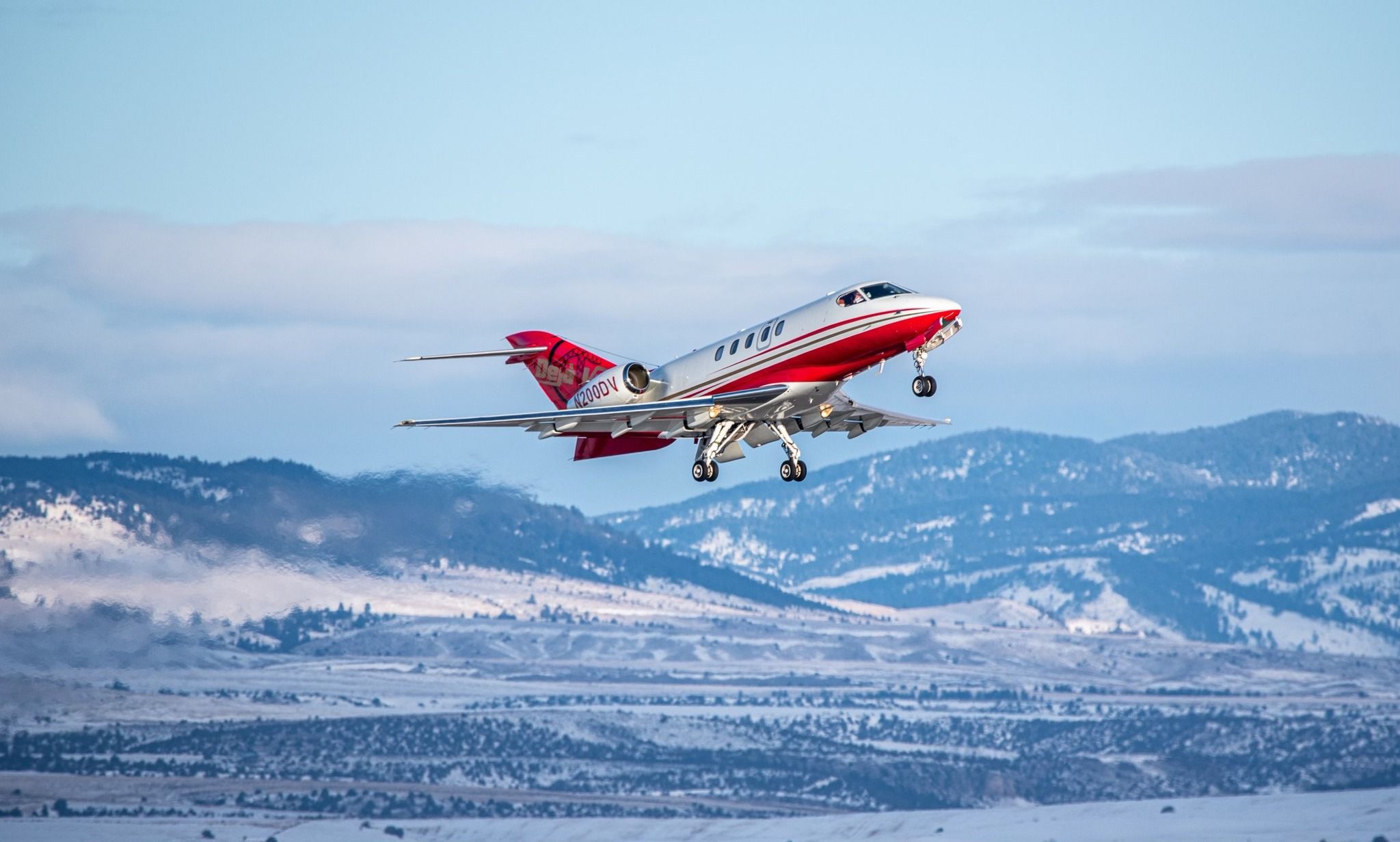 A SyberJet SJ30 just after taking off.