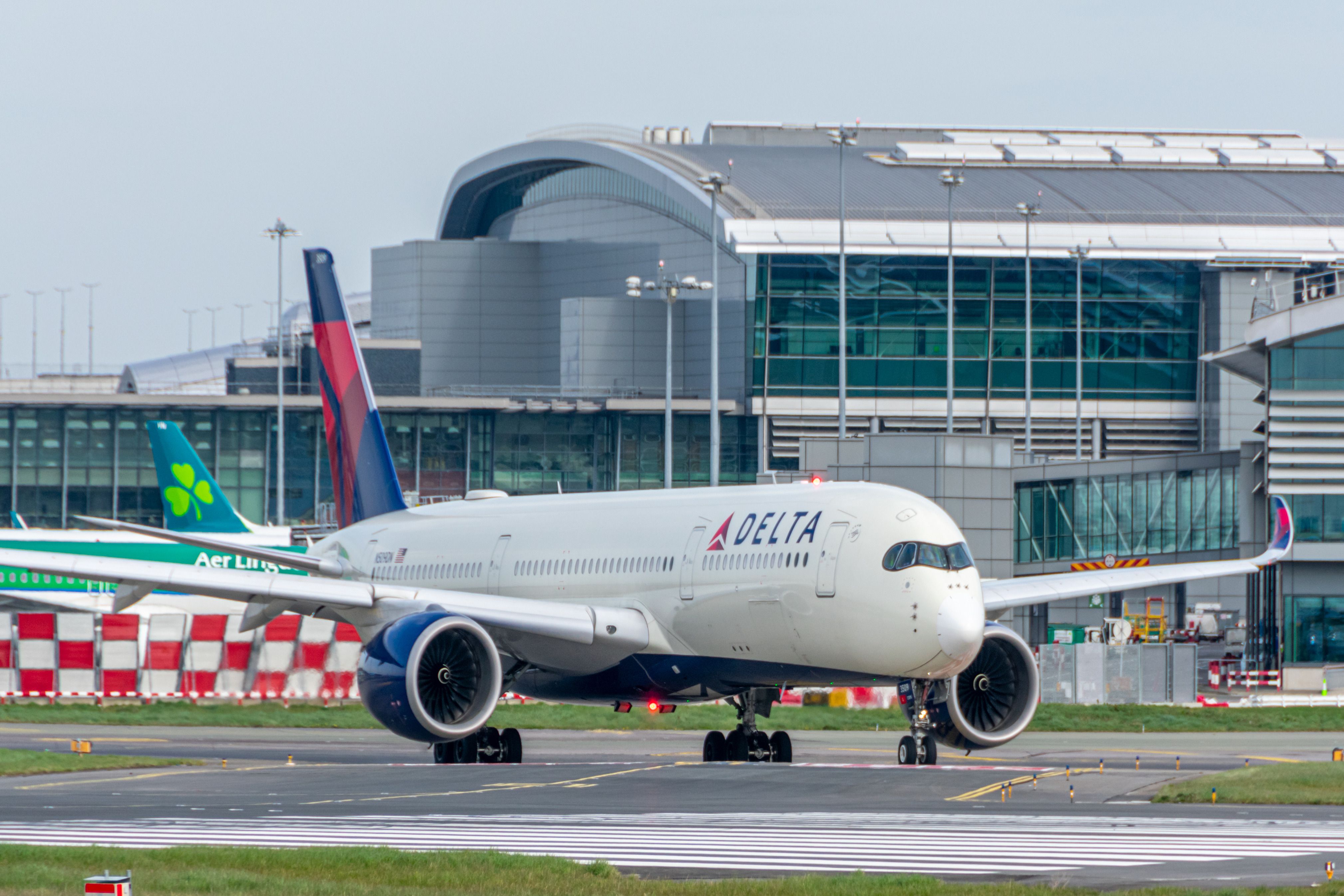 A Delta Air Lines Airbus A350 on an airport apron.