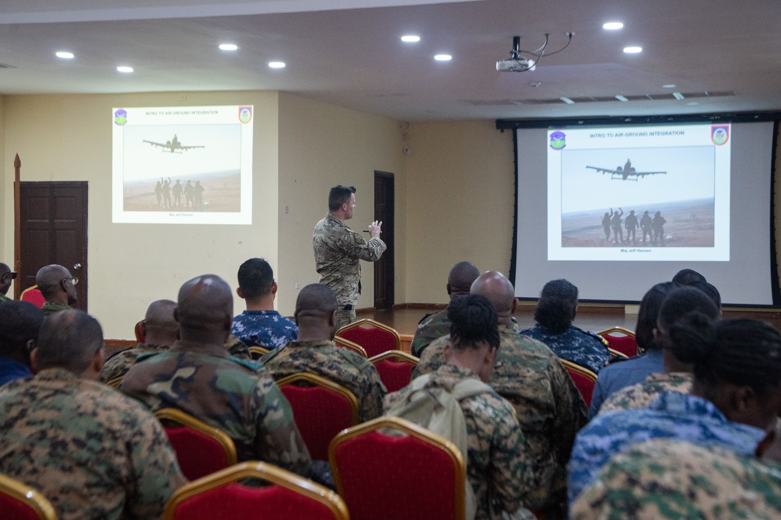 An Oklahoma ANG officer briefs air-ground integration at Tradewinds 23 to multinational forces.