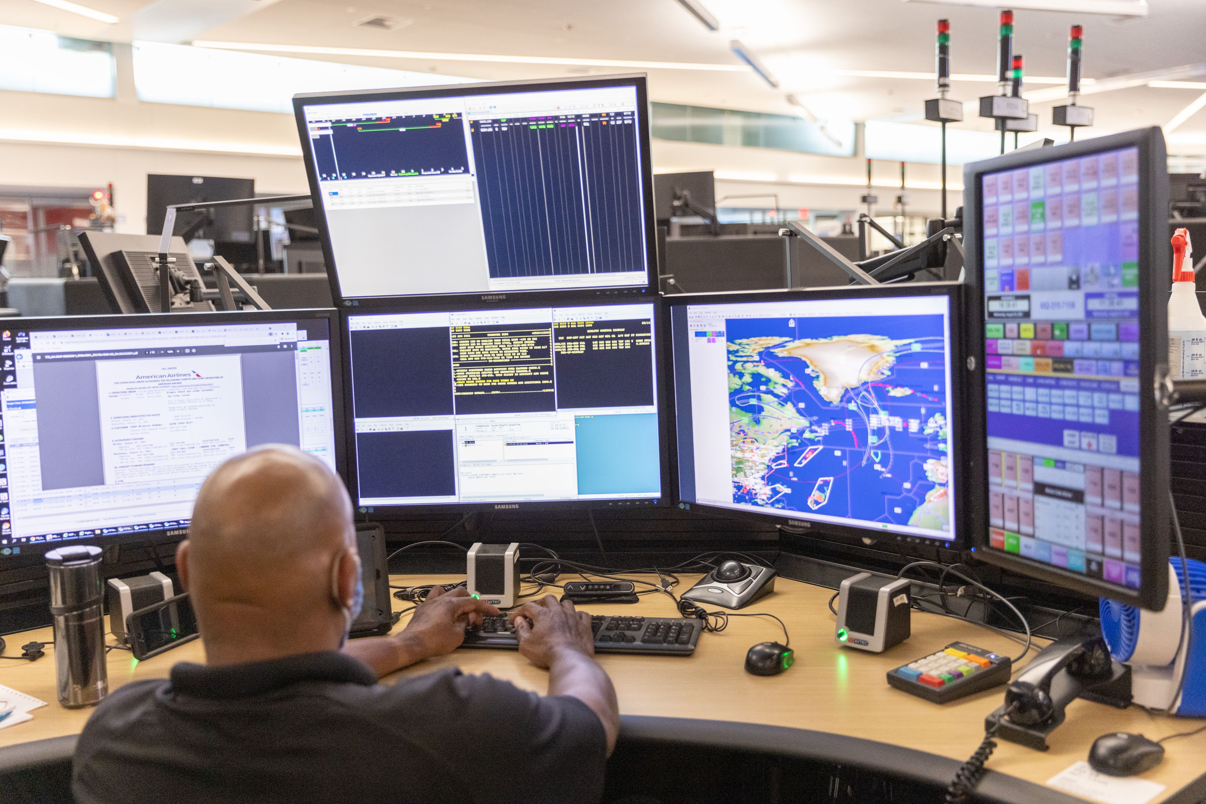 A dispatcher working on a transatlantic flight plane at American's IOC in Ft. Worth, TX.