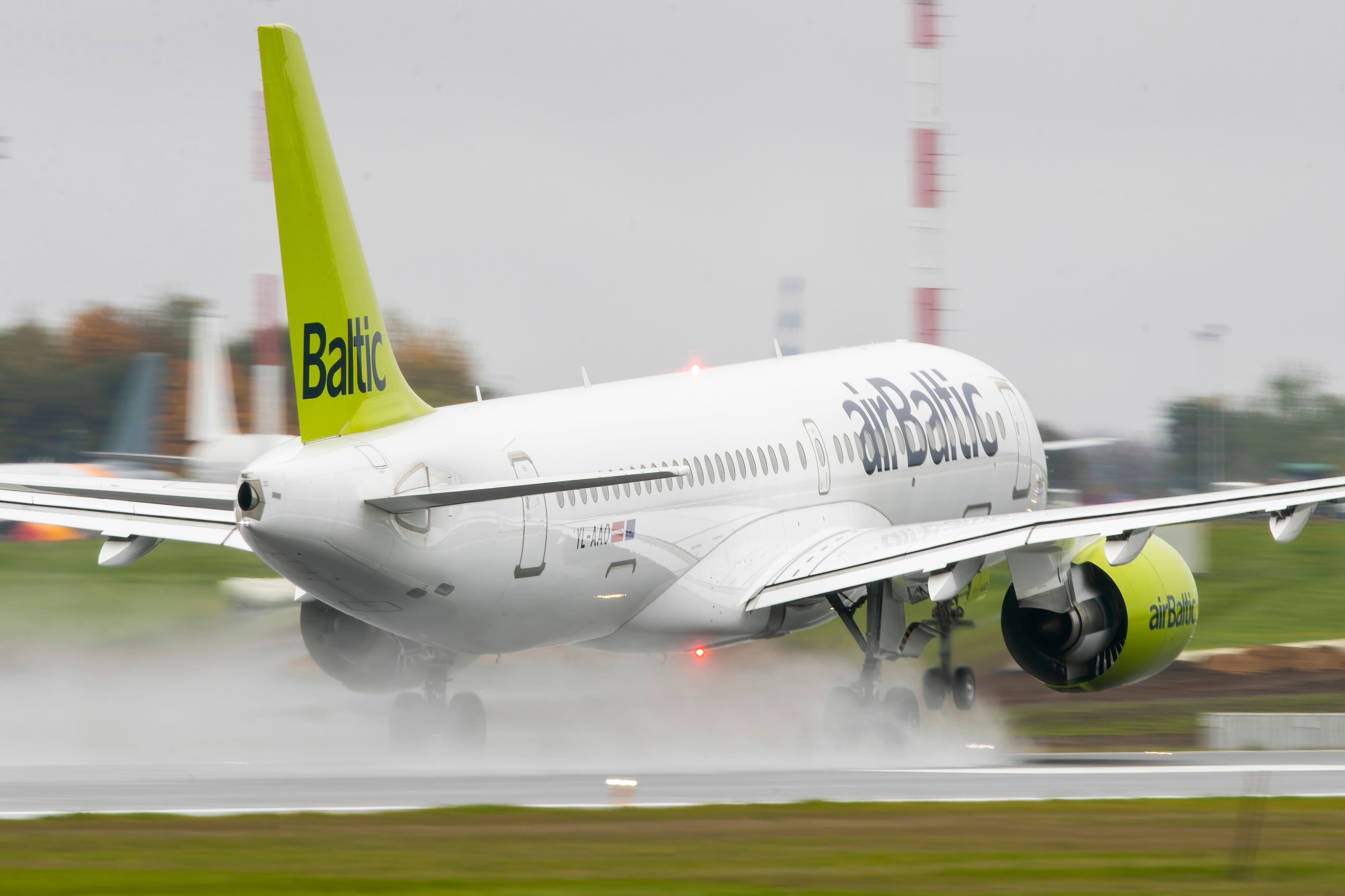 airBaltic Airbus A220-300 departing shutterstock_1832775808
