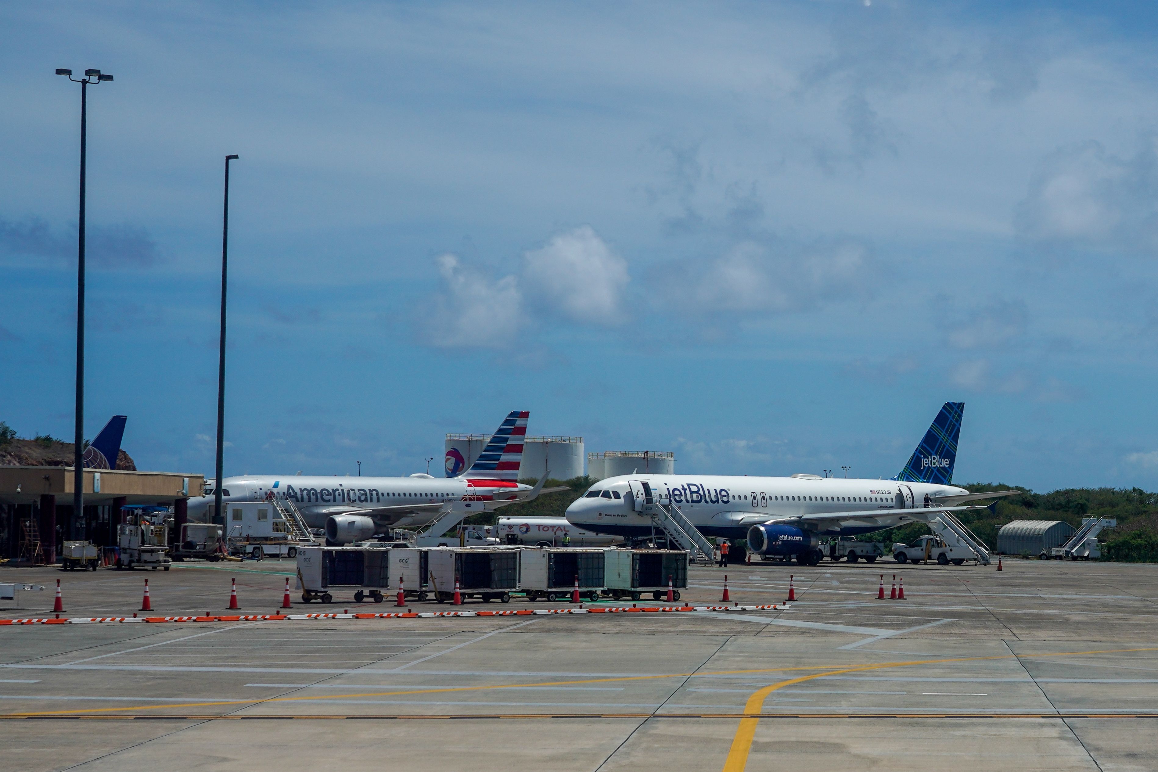 American Airlines and JetBlue aircraft on the apron at St. Thomas.