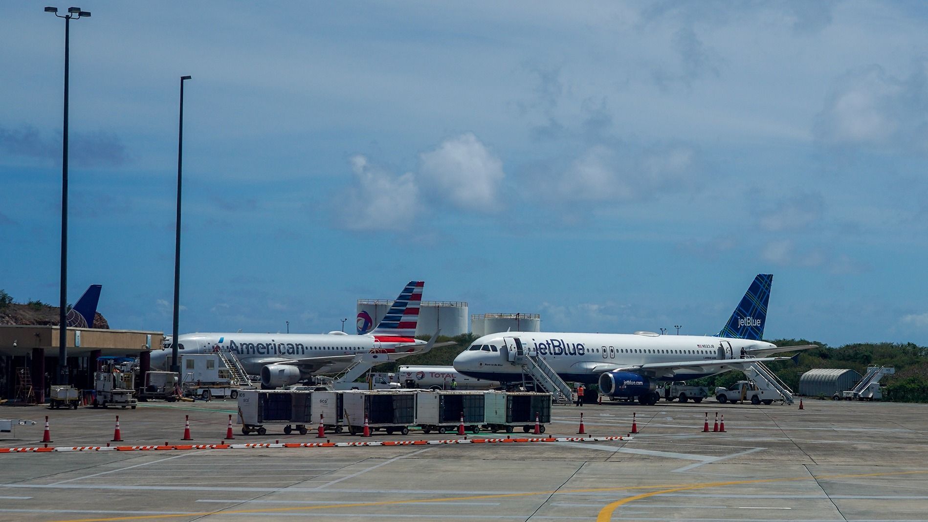 American Airlines and JetBlue aircraft on the apron at St. Thomas.