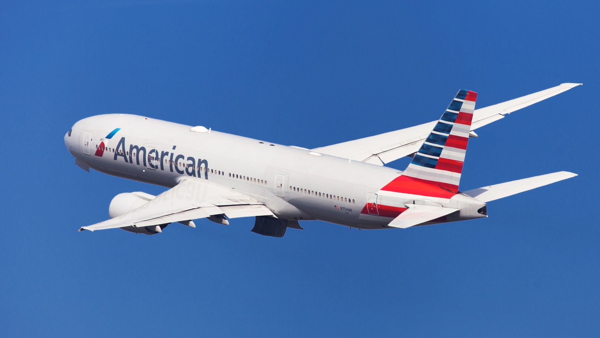 American Airlines Boeing 777-200ER departing shutterstock_1161243796