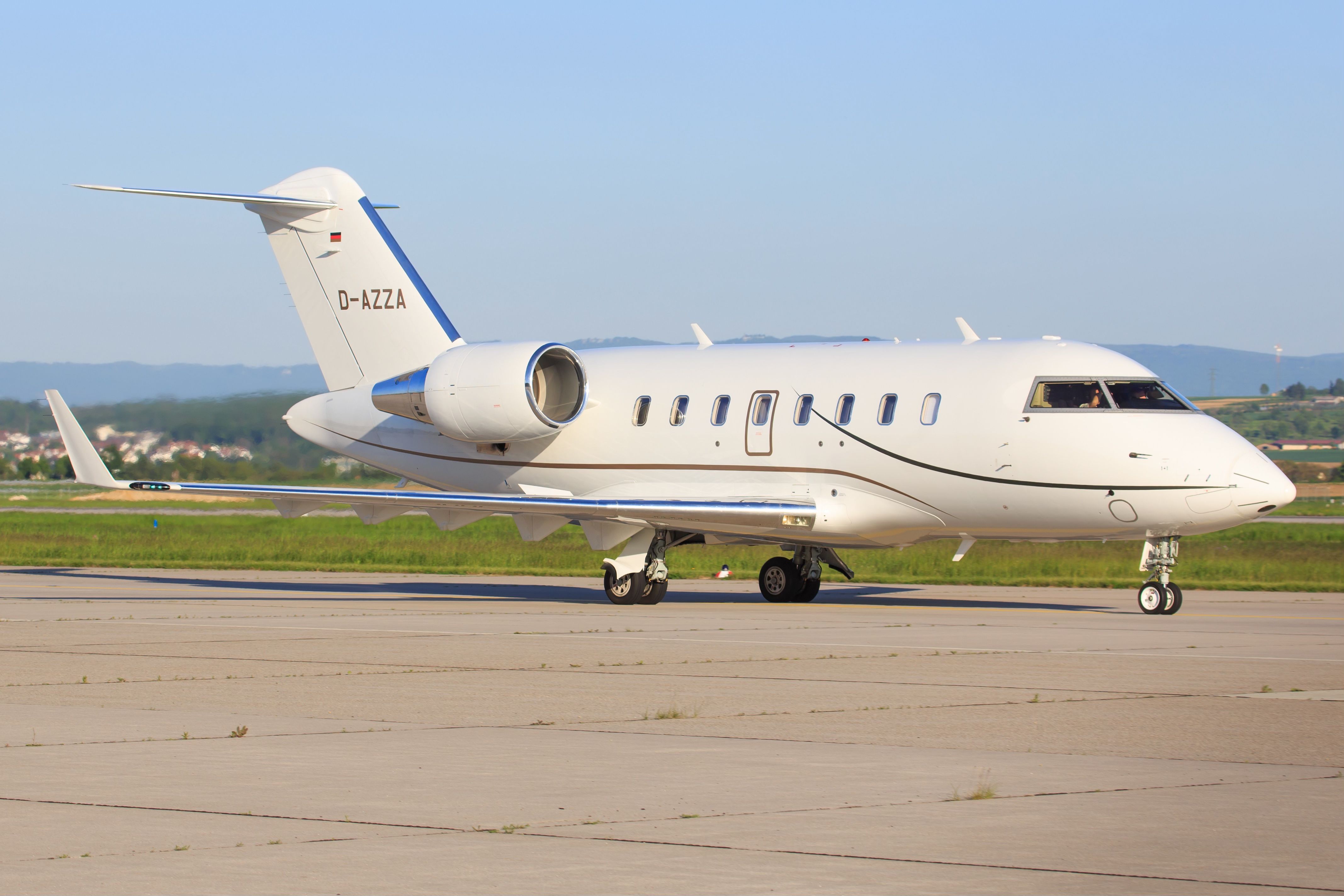 A Bombardier Challenger 600 on an airport apron.