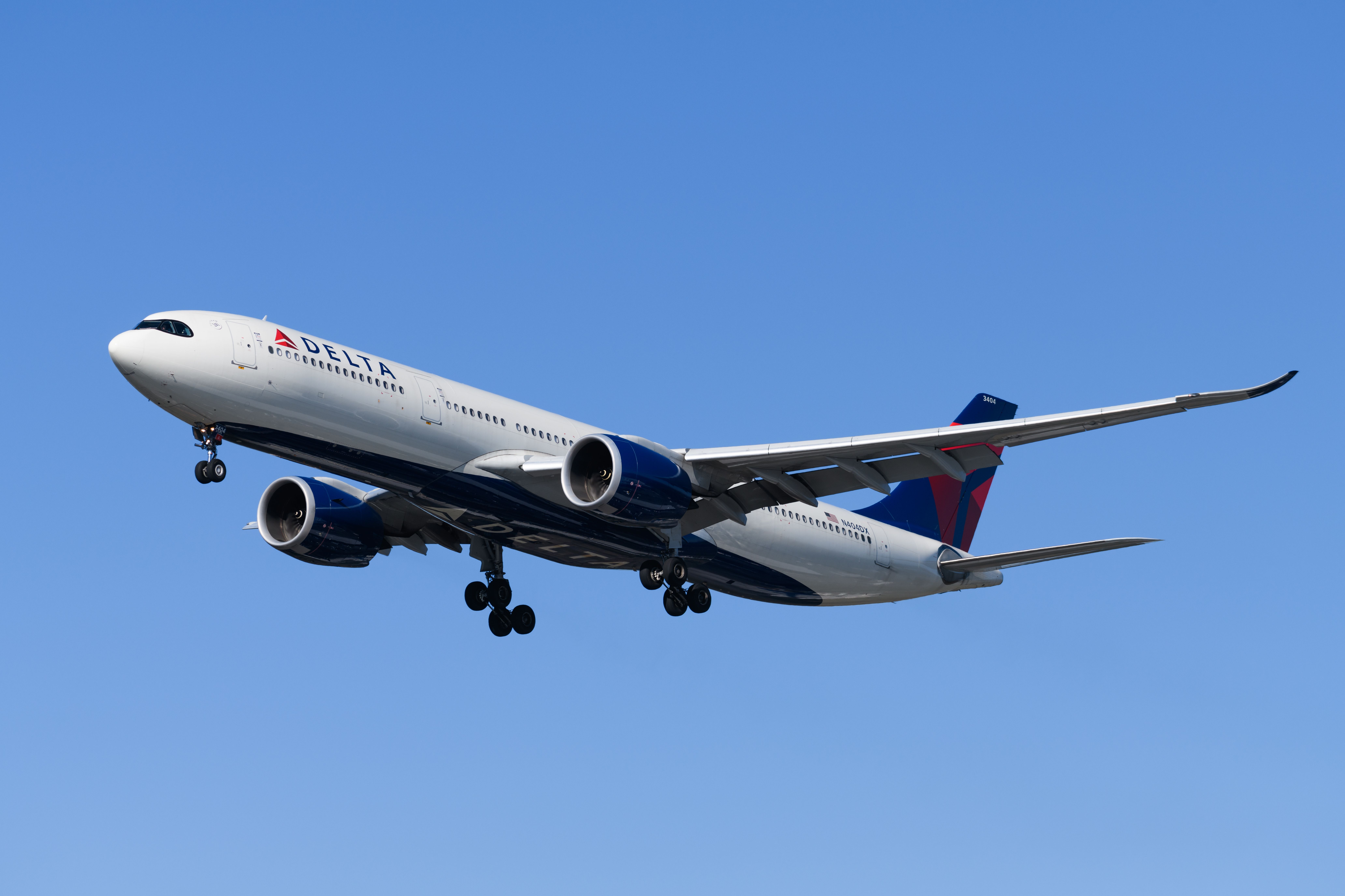 Delta Air Lines Airbus A330-900 landing at Seattle Tacoma International Airport SEA shutterstock_2128847765