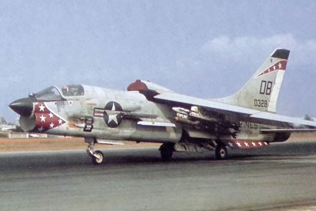 A Vought F-8 Crusader on an airfield apron.