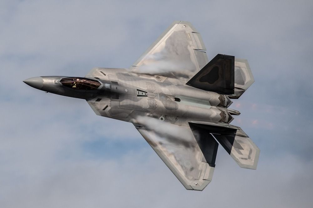 An F-22 banking
