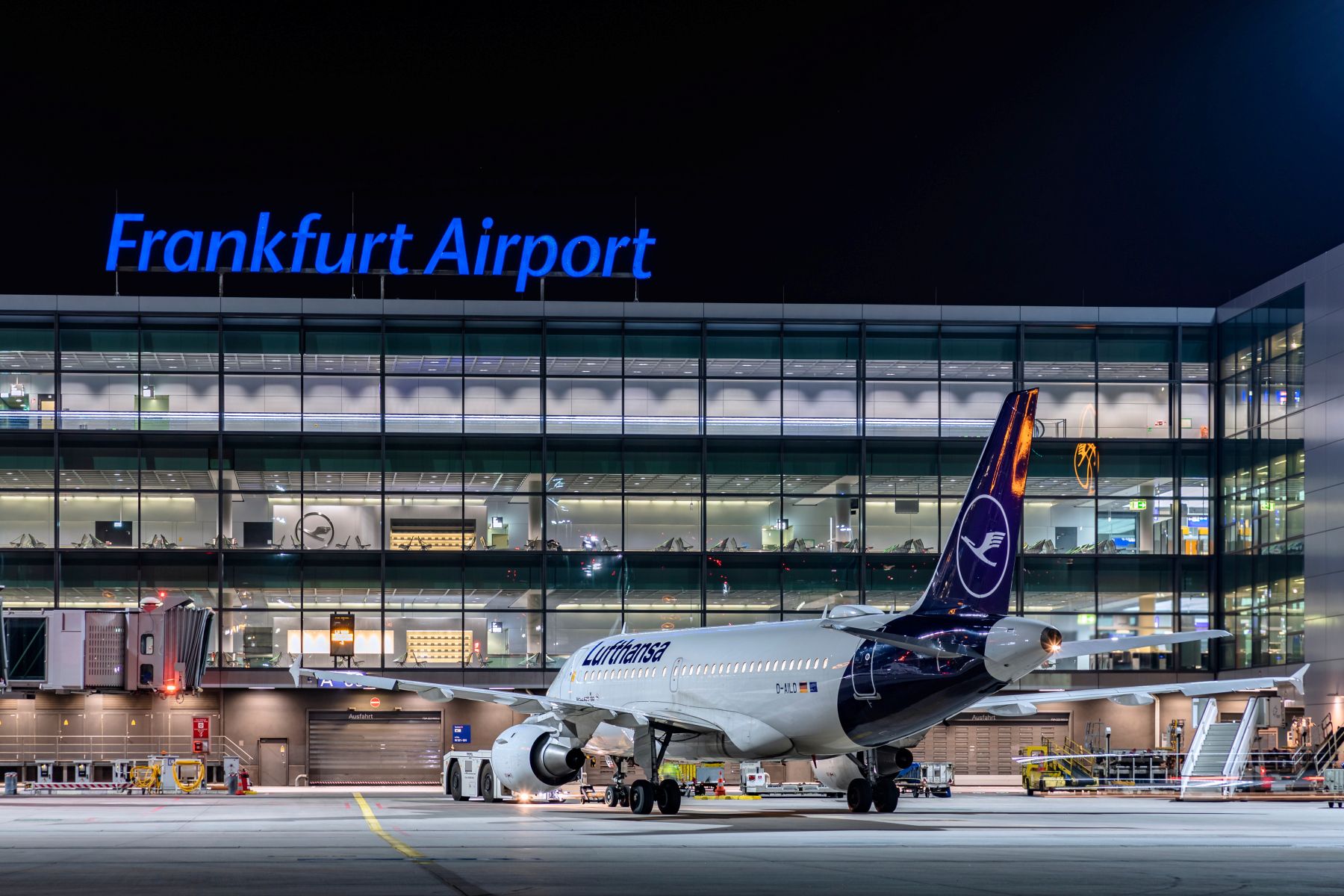 A Lufthansa plane at Frankfurt Airport (FRA) at night