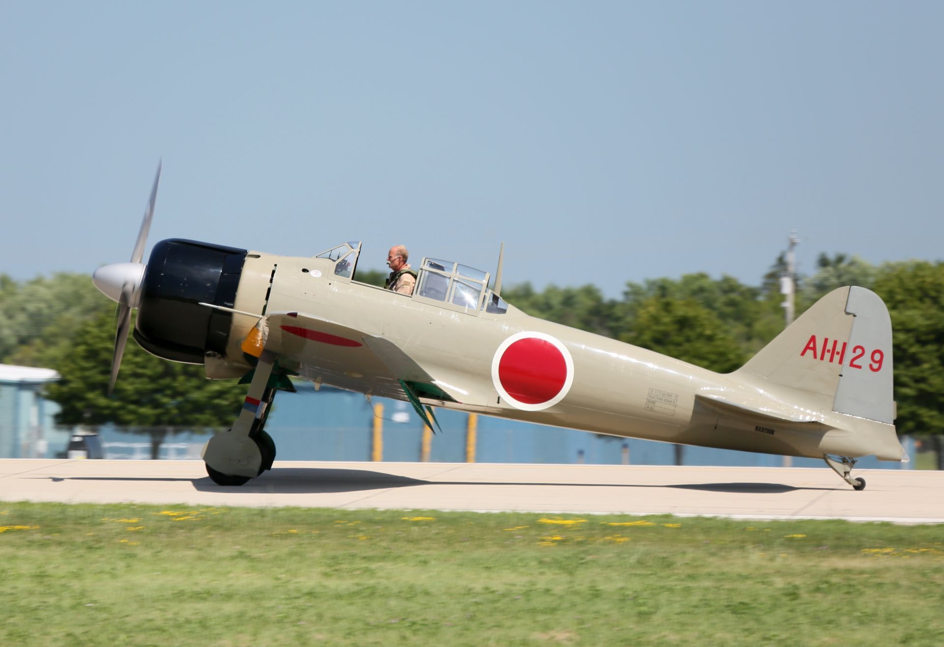 A Mitsubishi A6M "Zero" on an airfield apron.