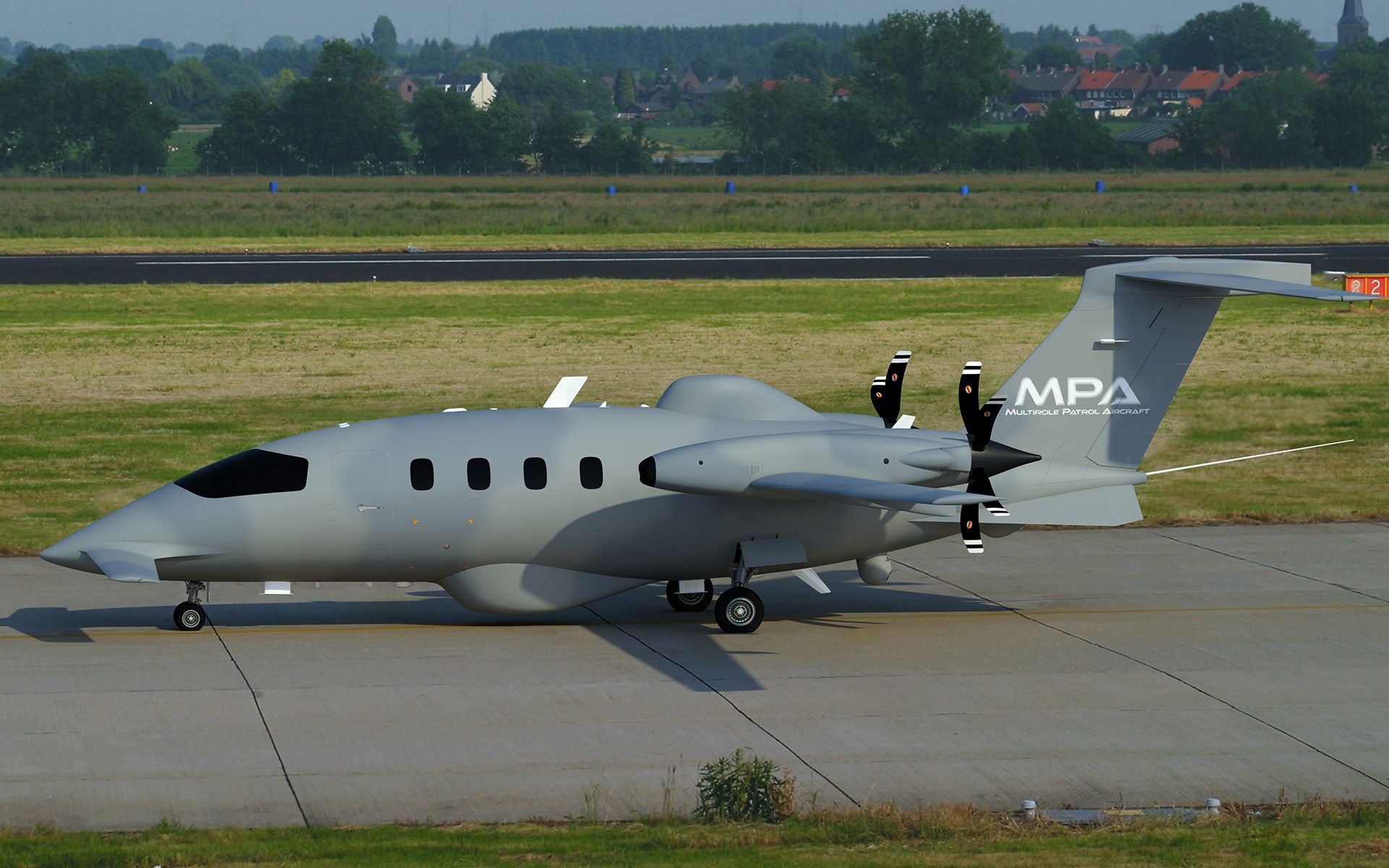 A Piaggio Aerospace MPA on an airport apron.