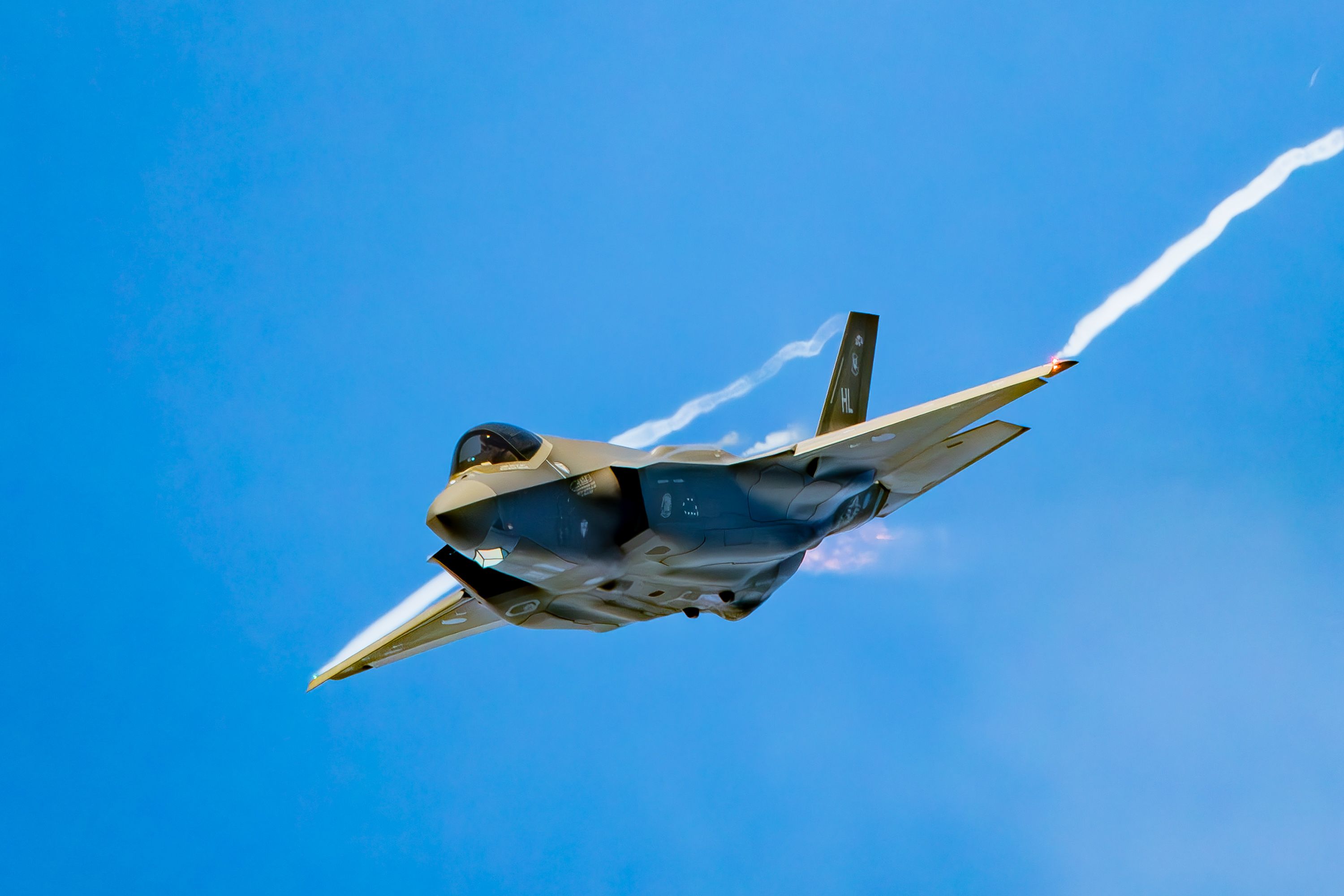 An F-35A flying in the sky.