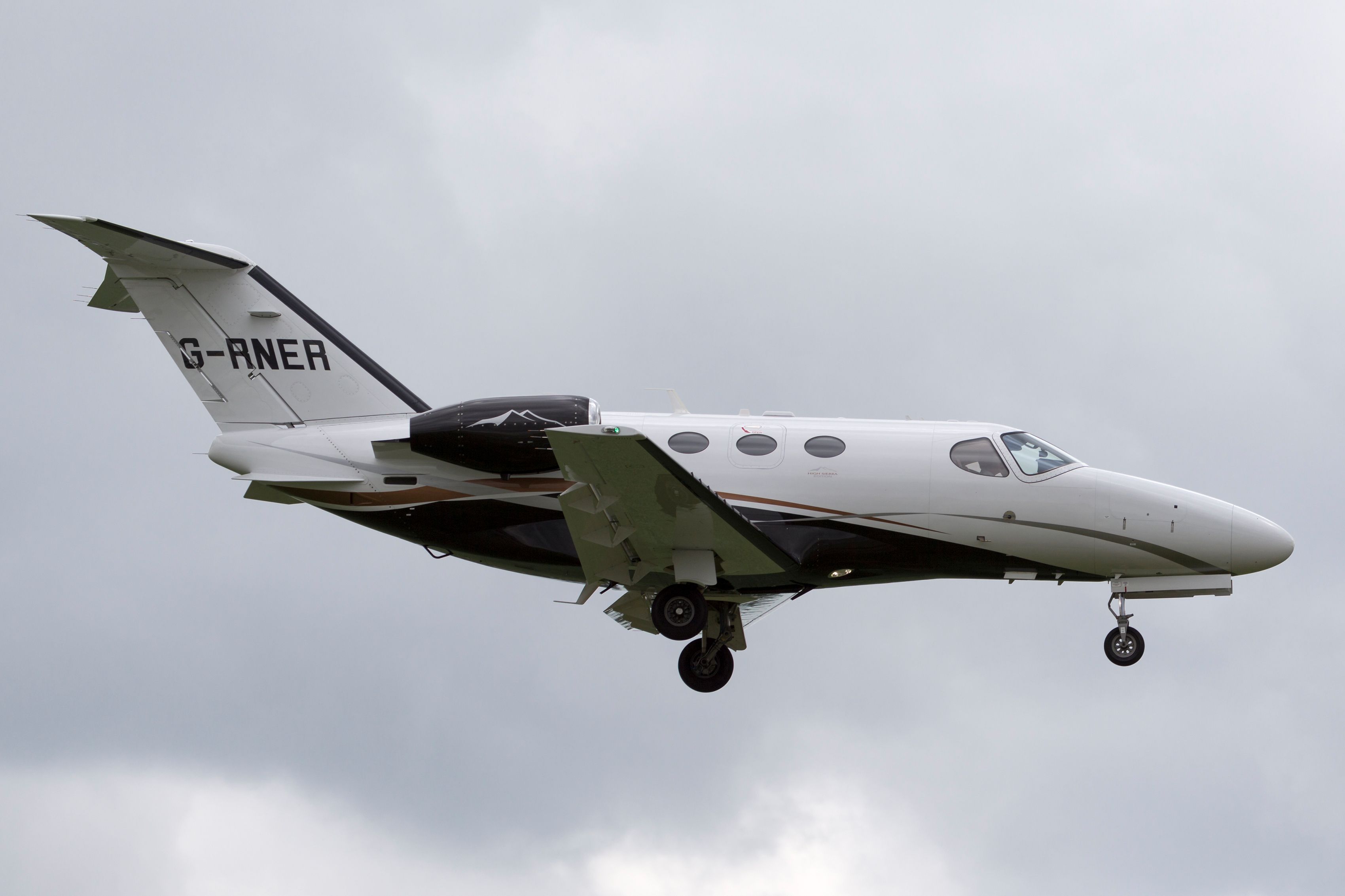 Cessna 510 Citation Mustang light business jet airplane G-RNER on approach to land.