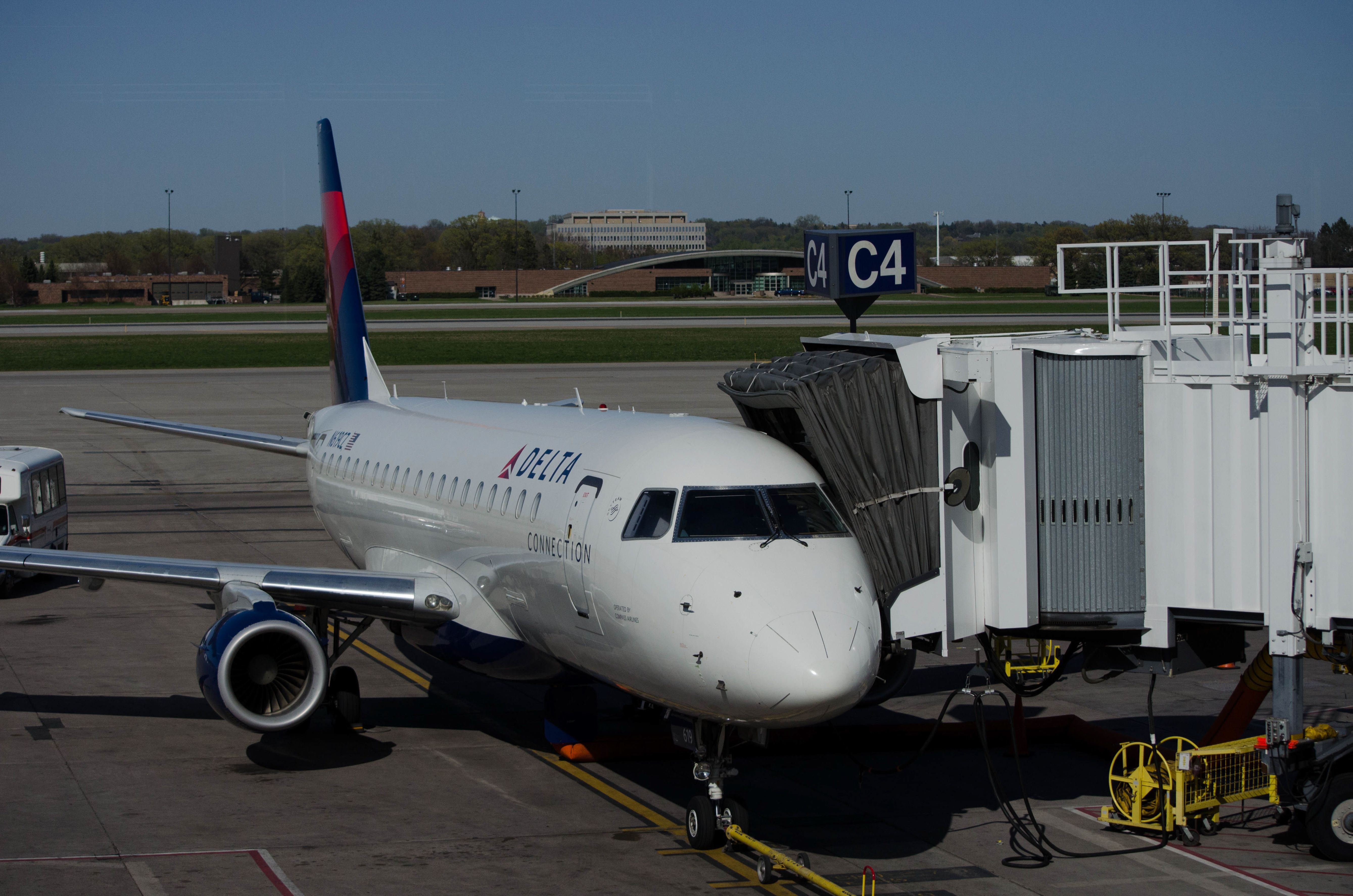 A Delta Connection aircraft parked at Minneapolis airport.