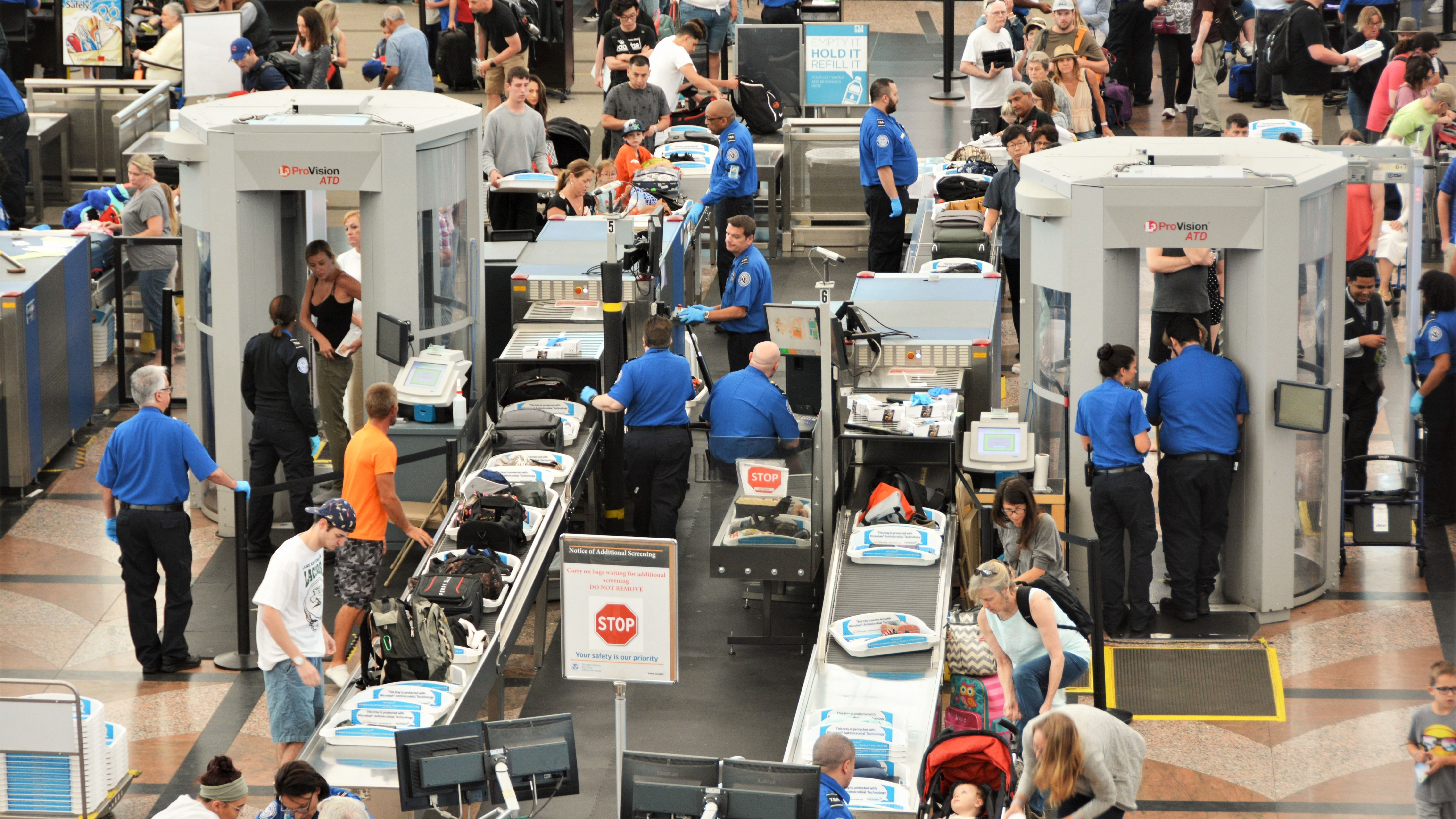 The busy TSA screening checkpoint at Denver International Airport.