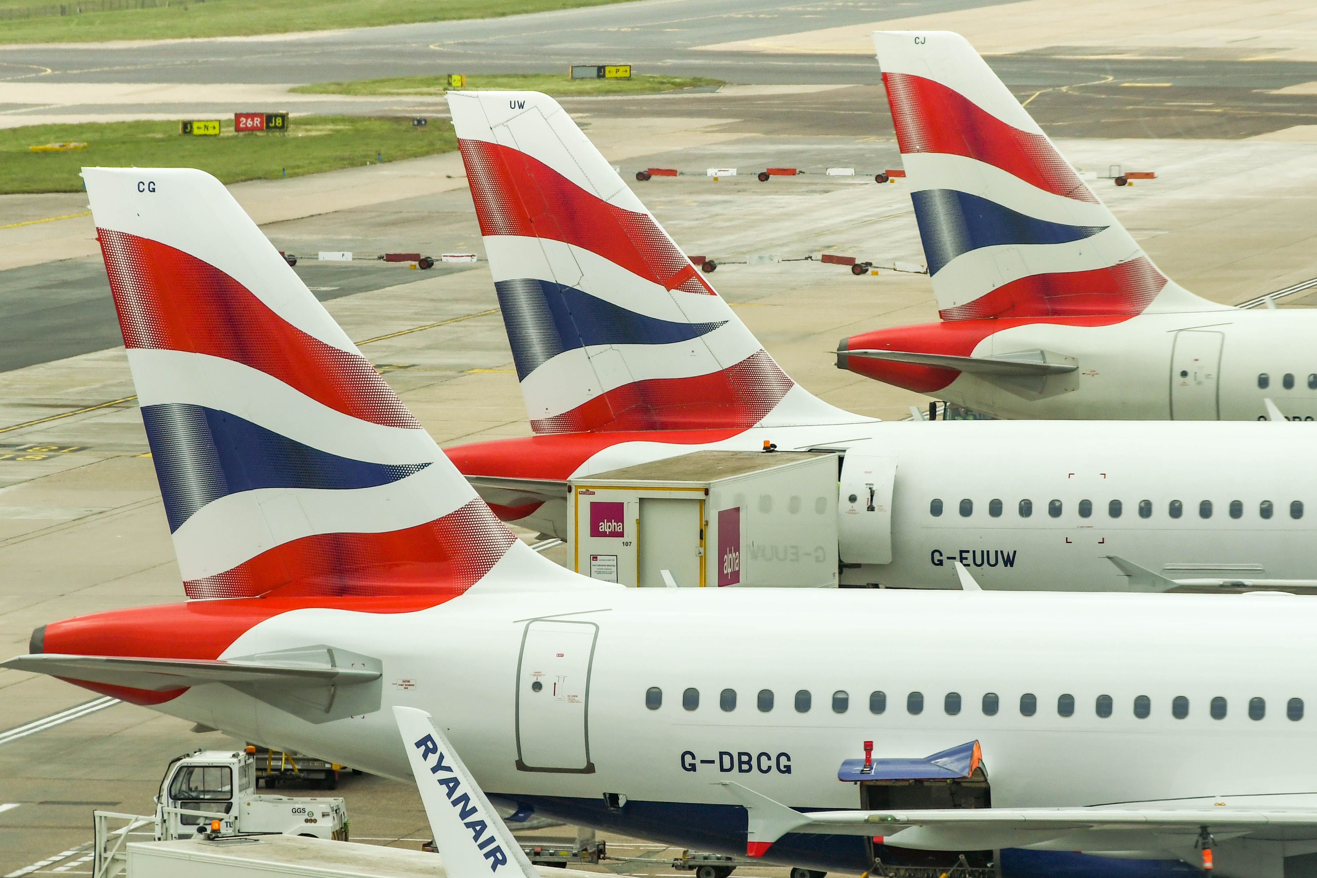 Three British Airways Aircraft parked at Gatwick. 