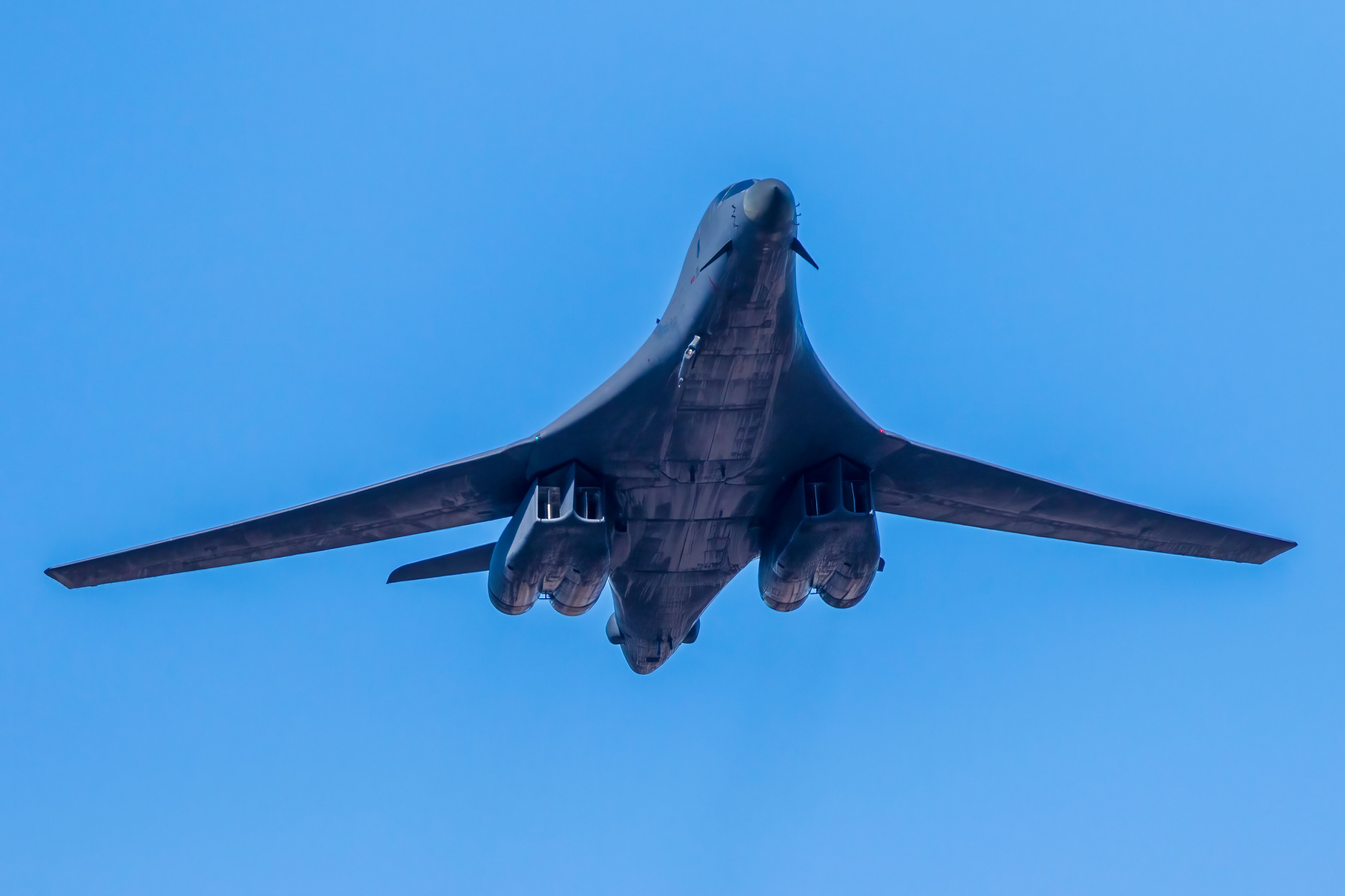 A B-1B lancer flying in the sky.