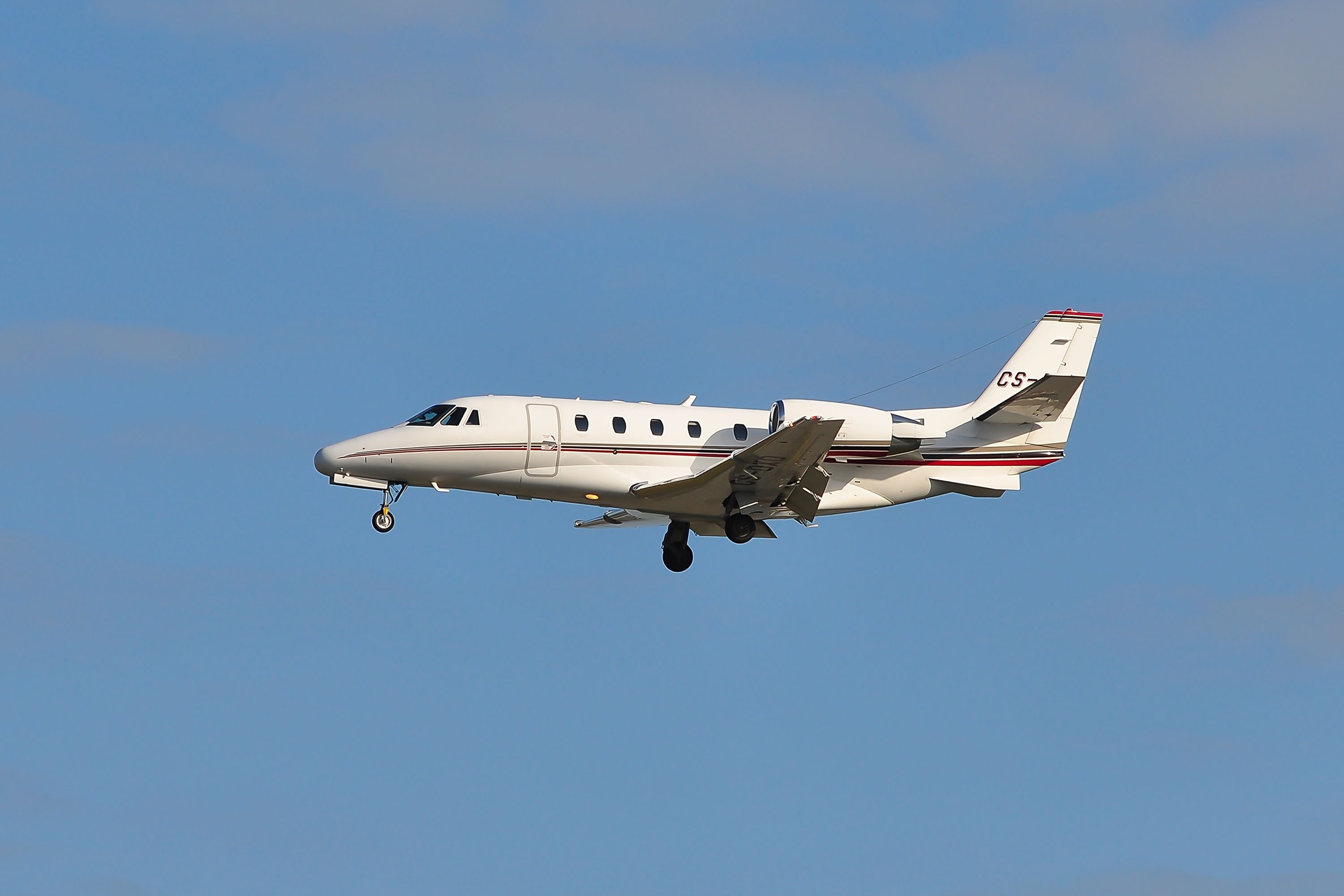 A NetJets Europe Cessna 560 Citation Excel flying in the sky.