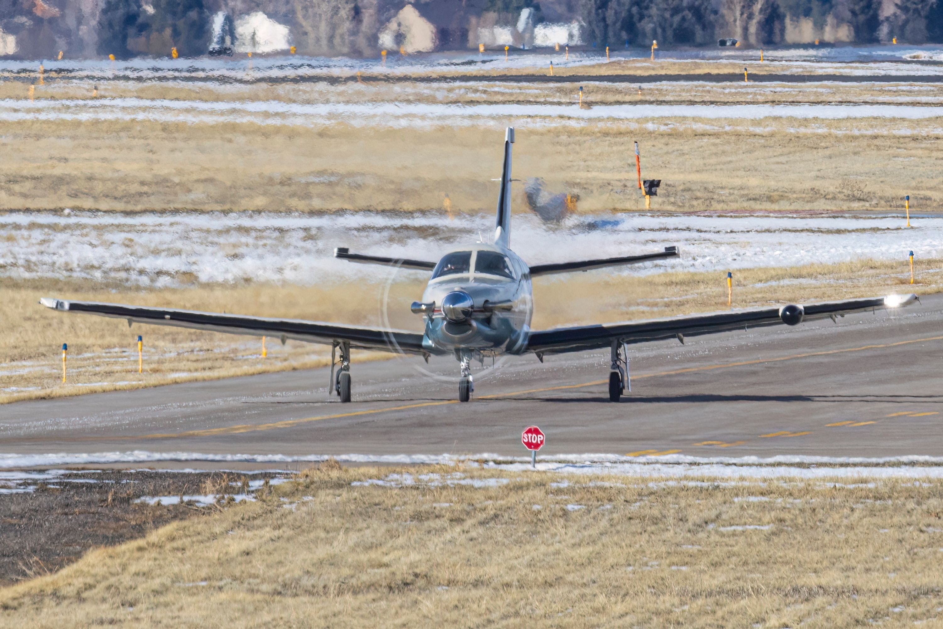 A Socata TBM-700 taxis out for takeoff at Centennial Airport