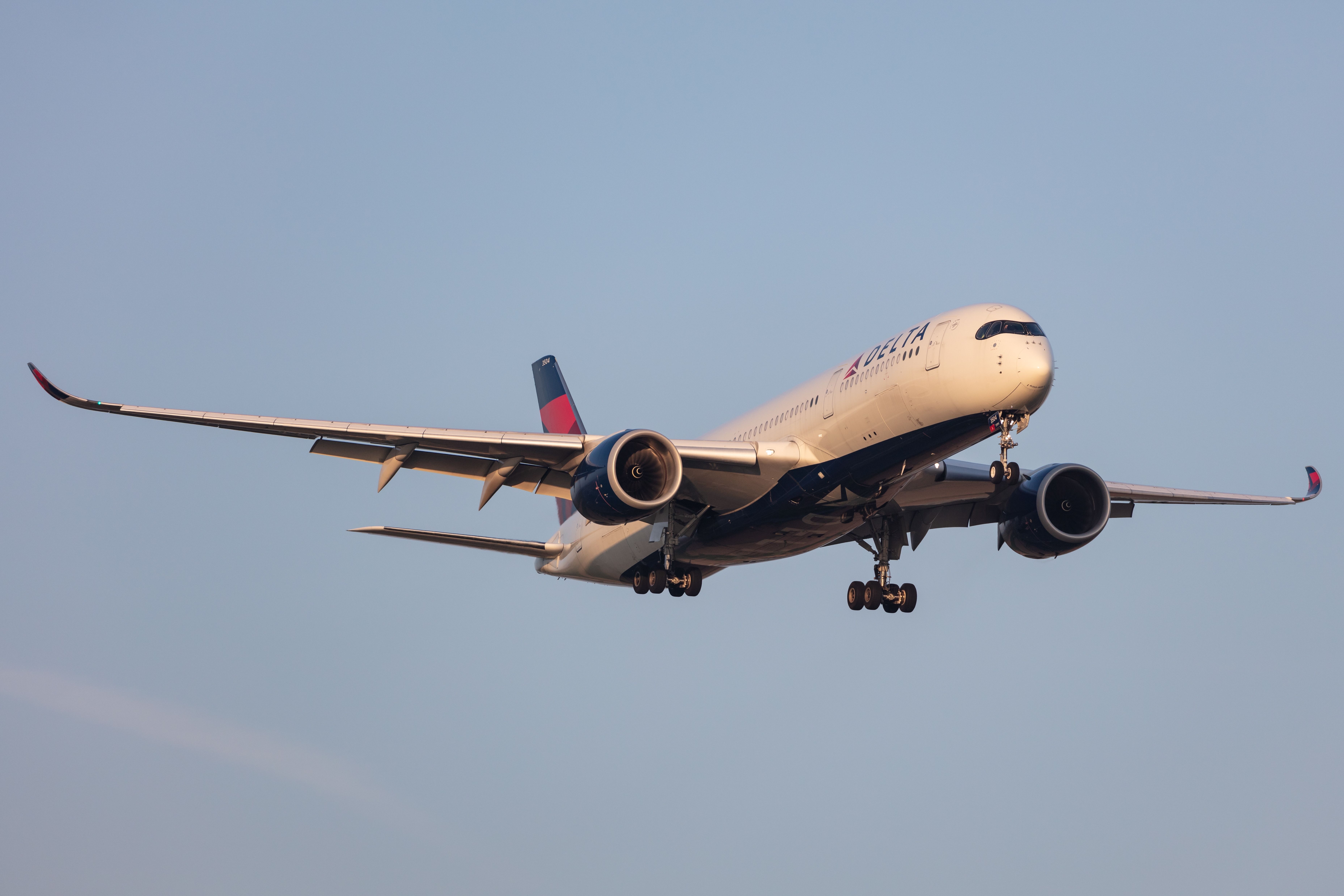 Delta Air Lines Airbus A350-941 landing at Amsterdam Schiphol Airport.