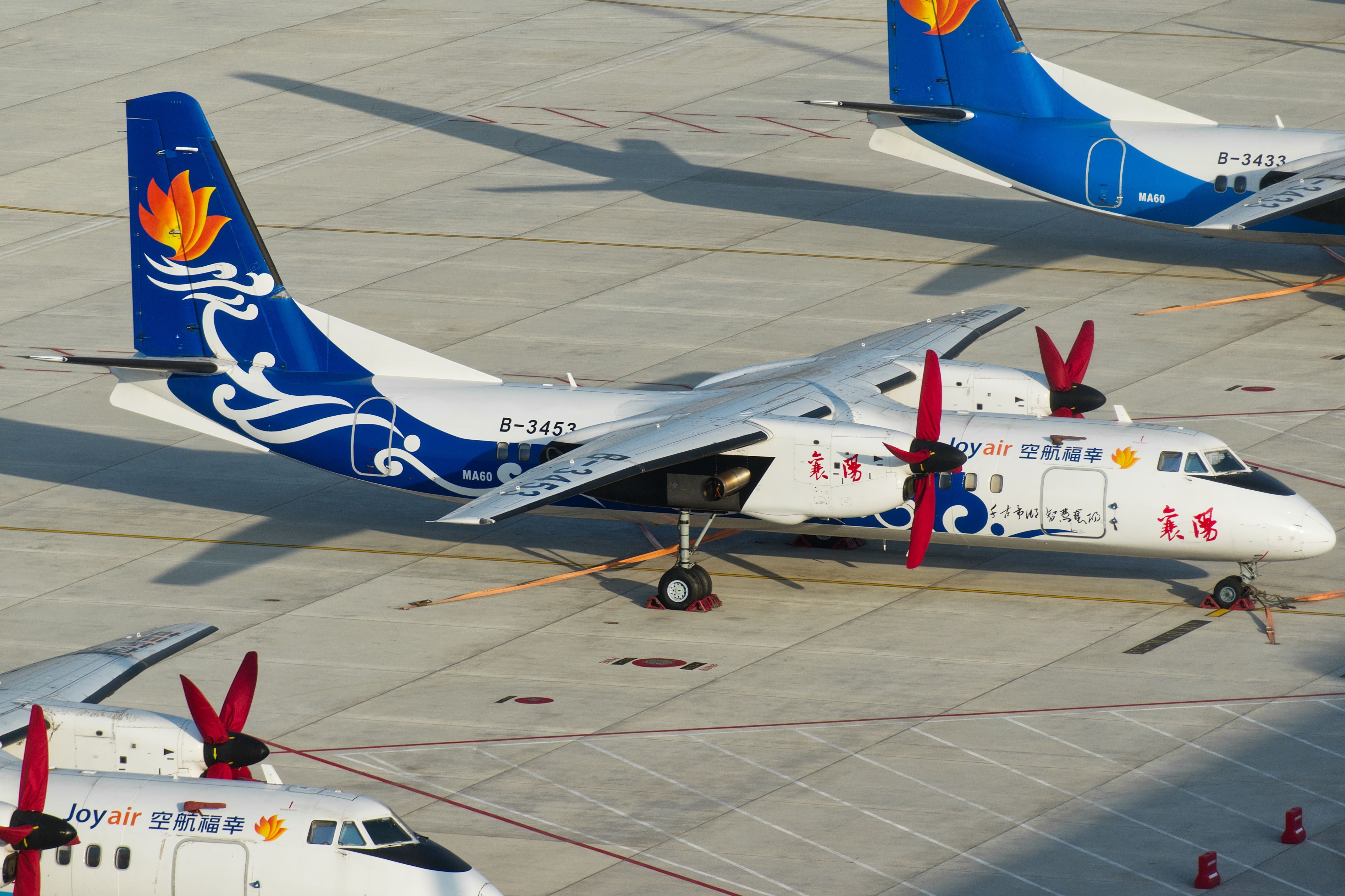 A Joy Air Xian MA60 on an airport apron.