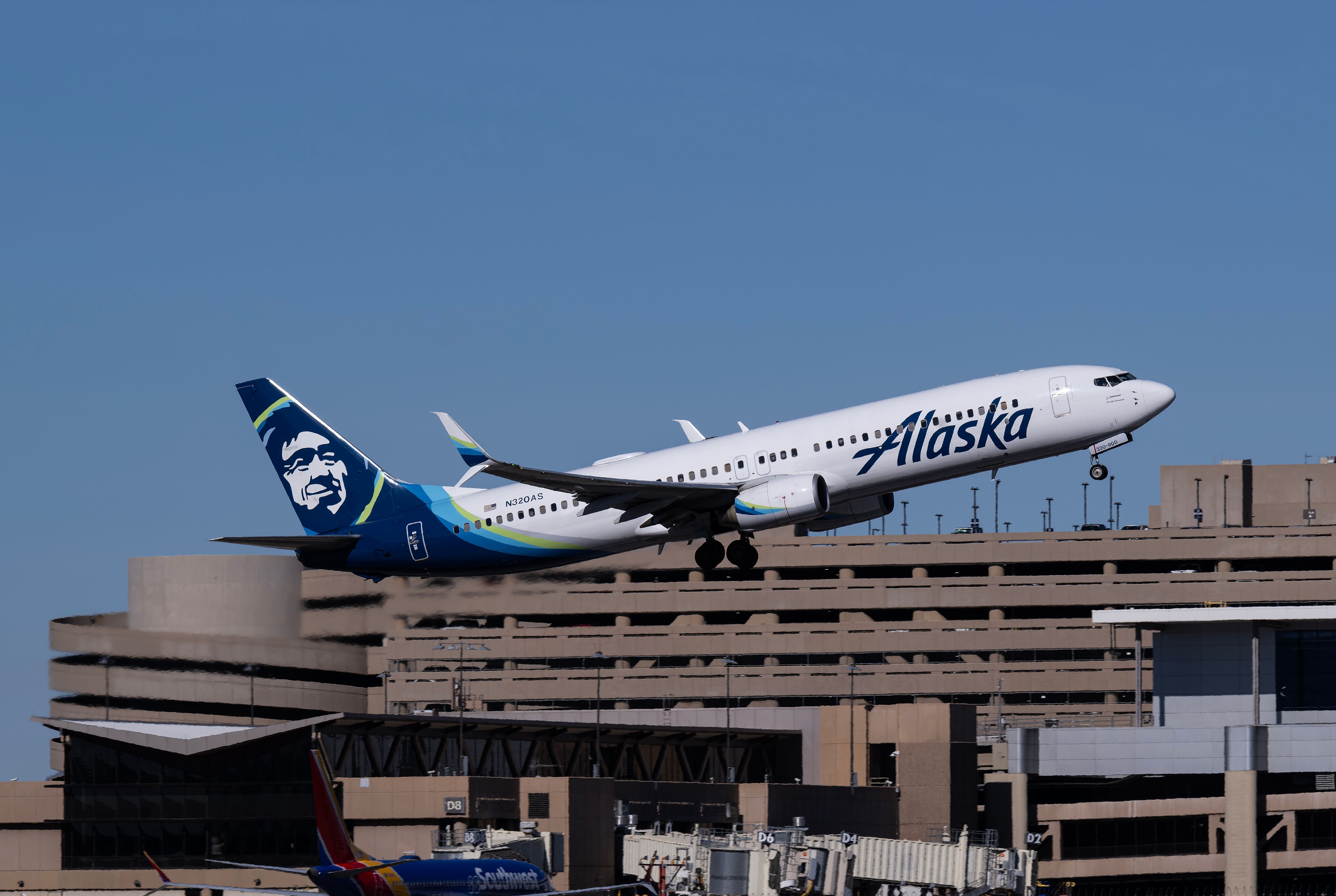 An Alaska Airlines Boeing 737-900 taking off from Phoenix.