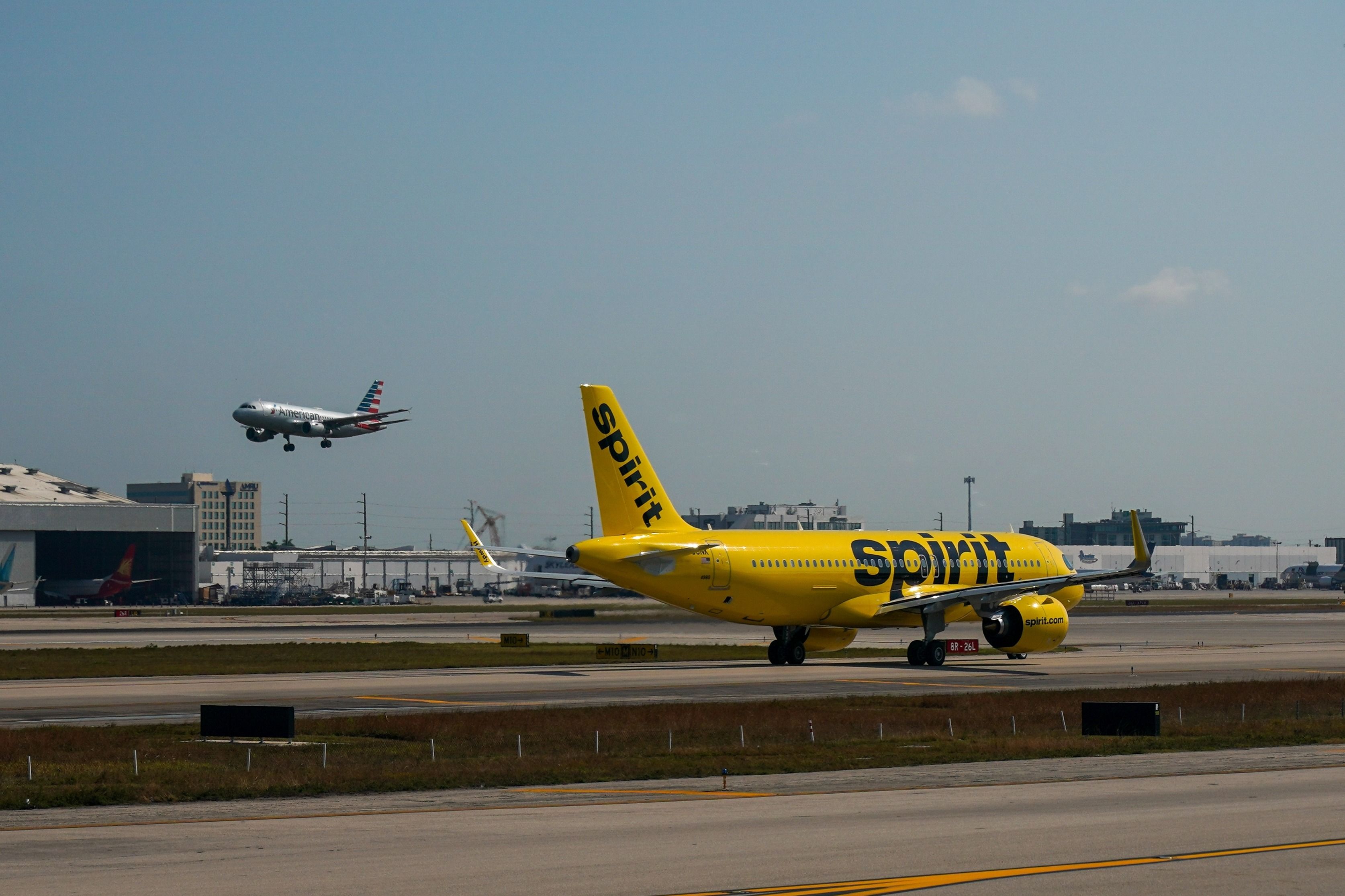 Spirit Airlines plane on tarmac at Miami International Airport.