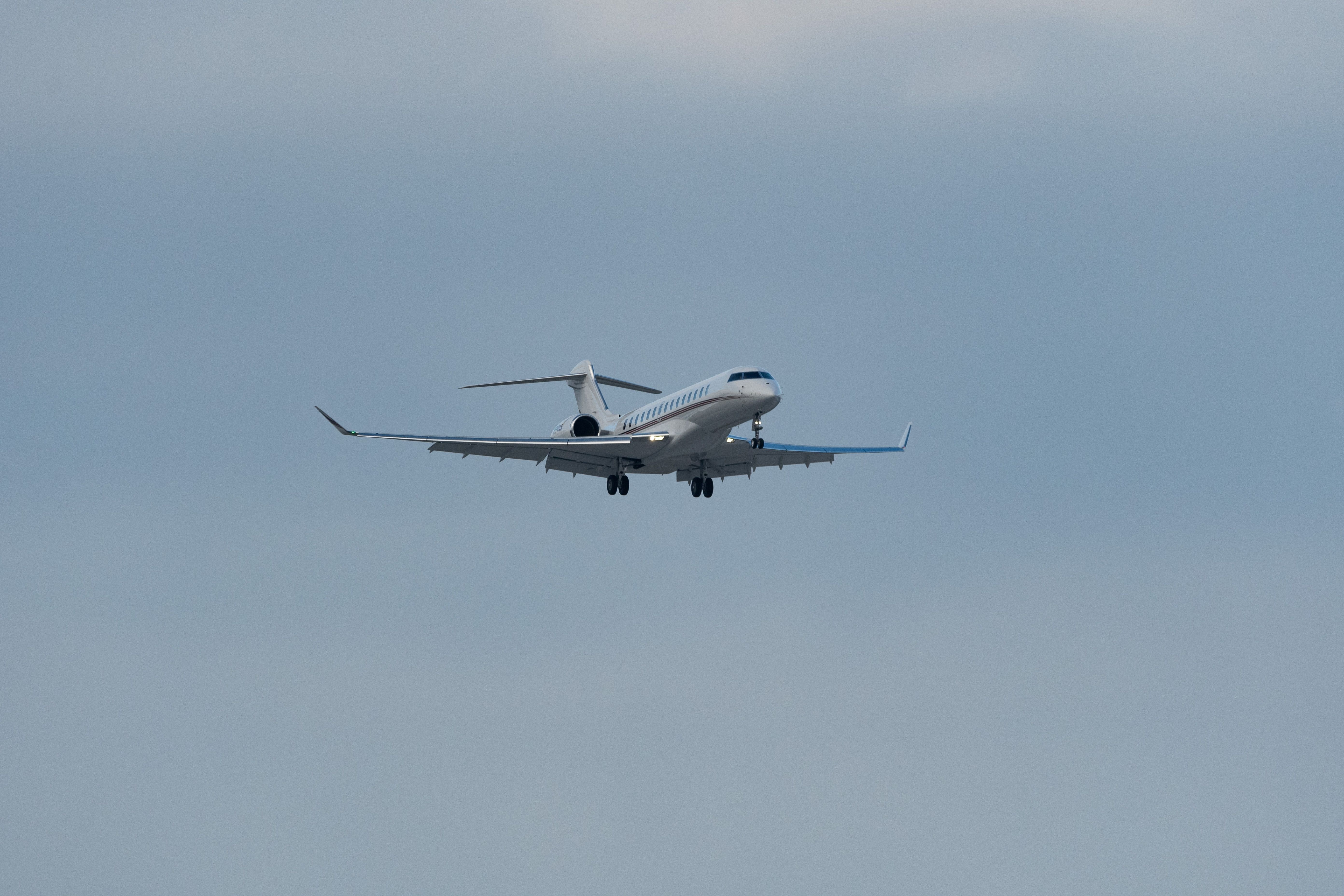 Net Jets Bombardier Global 7500 aircraft is landing on runway 14 in Davos