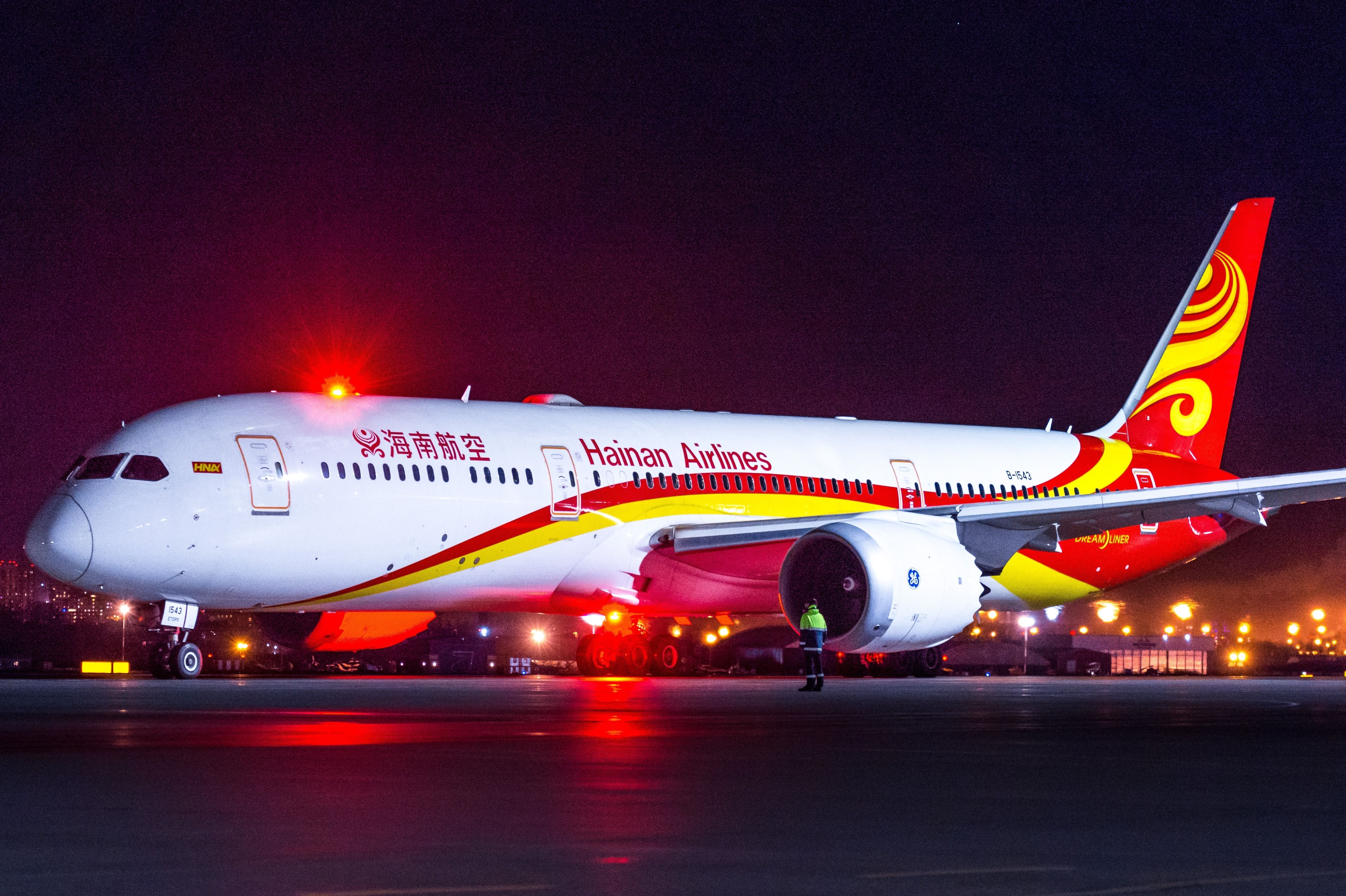 A Hainan Airlines Boeing 787 Dreamliner parked at an airport