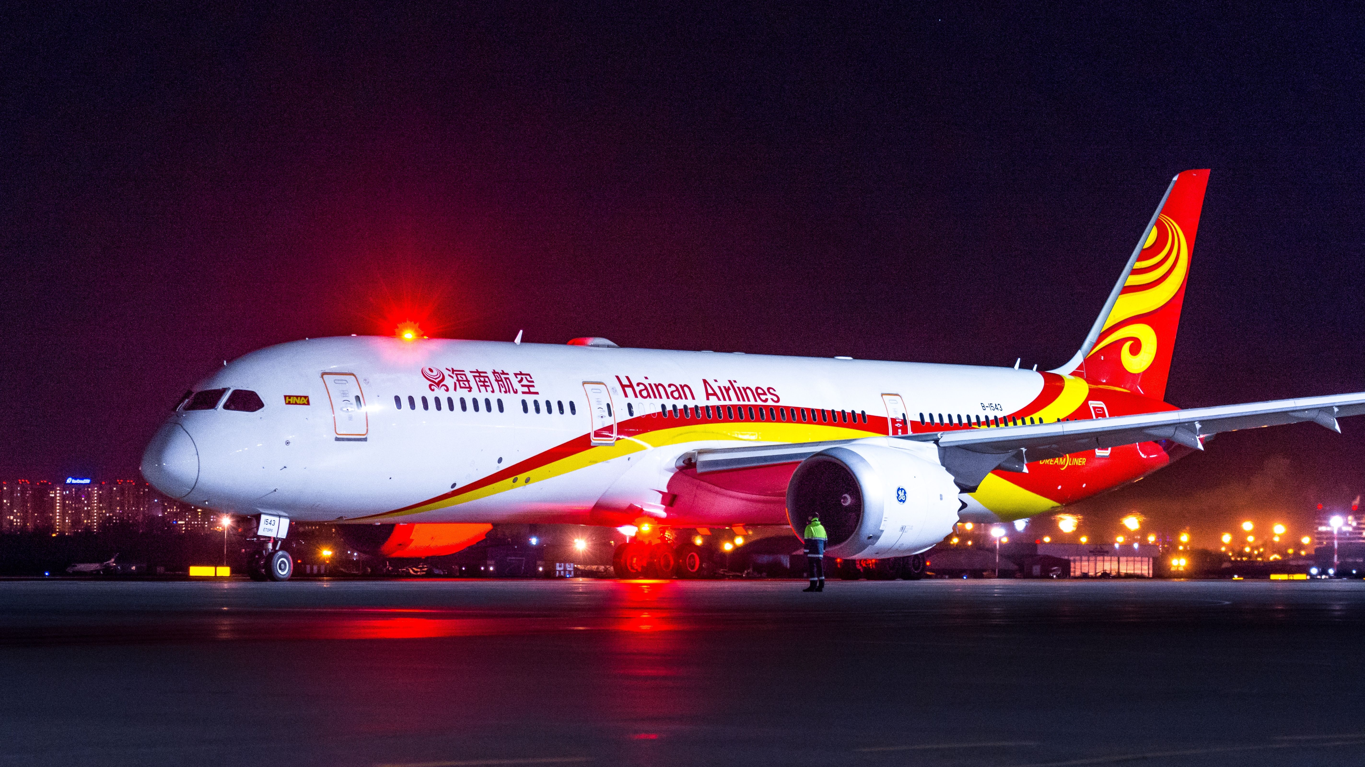 A Hainan Airlines Boeing 787 parked at an airport