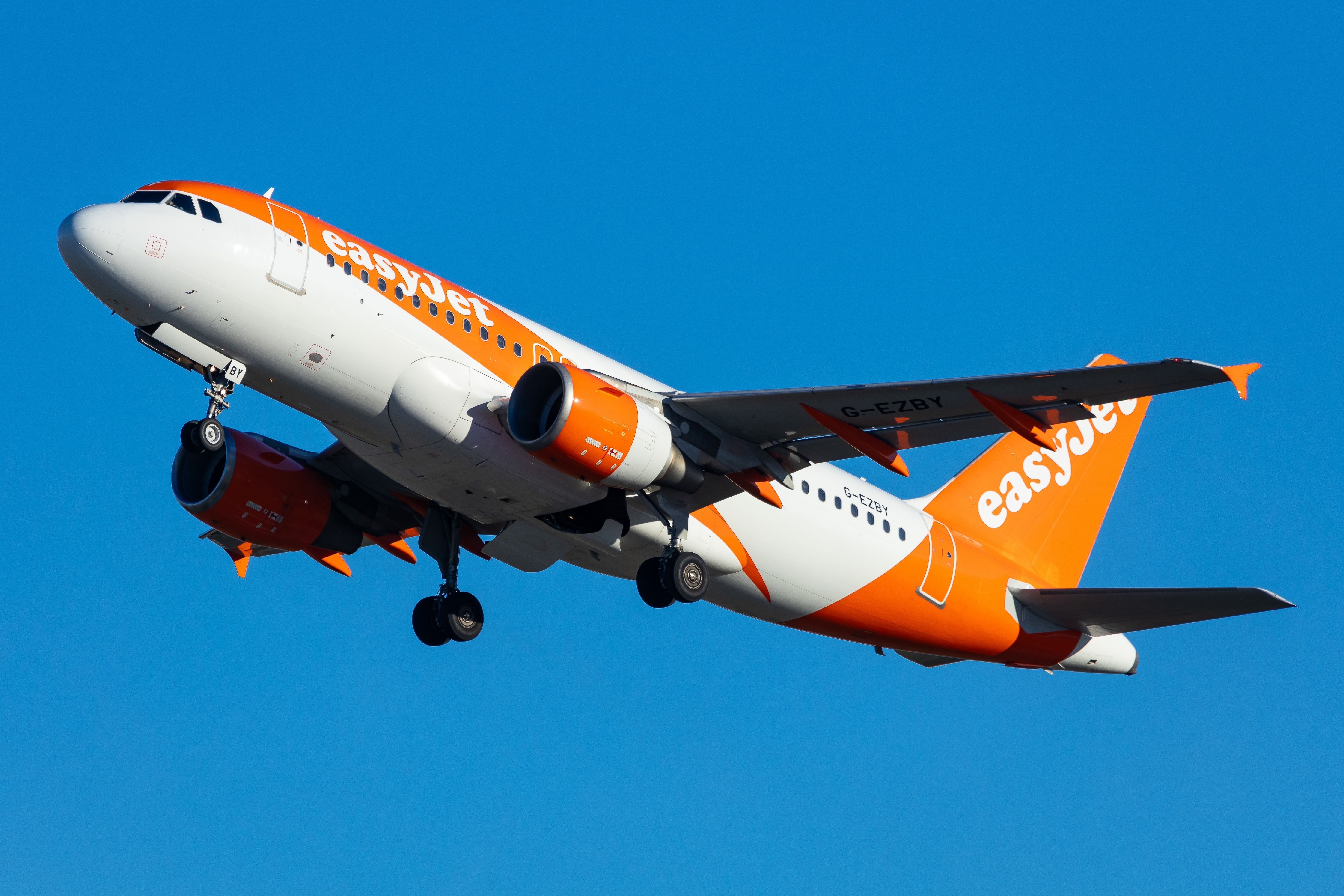 An easyJet Airbus A319 Flying in the sky.