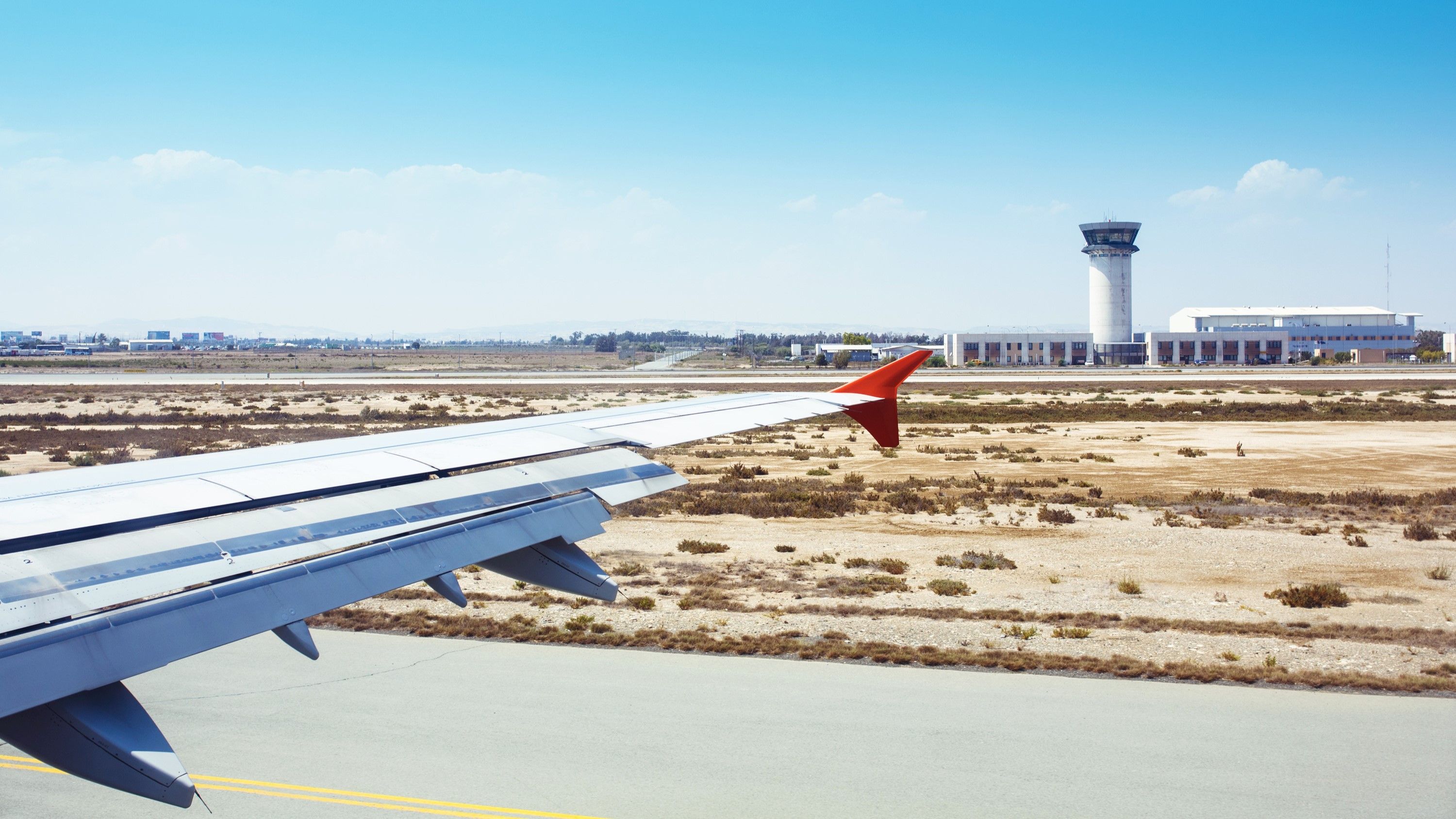 The Larnaca Airport ATC Tower as seen from the window of a commercial aircraft.