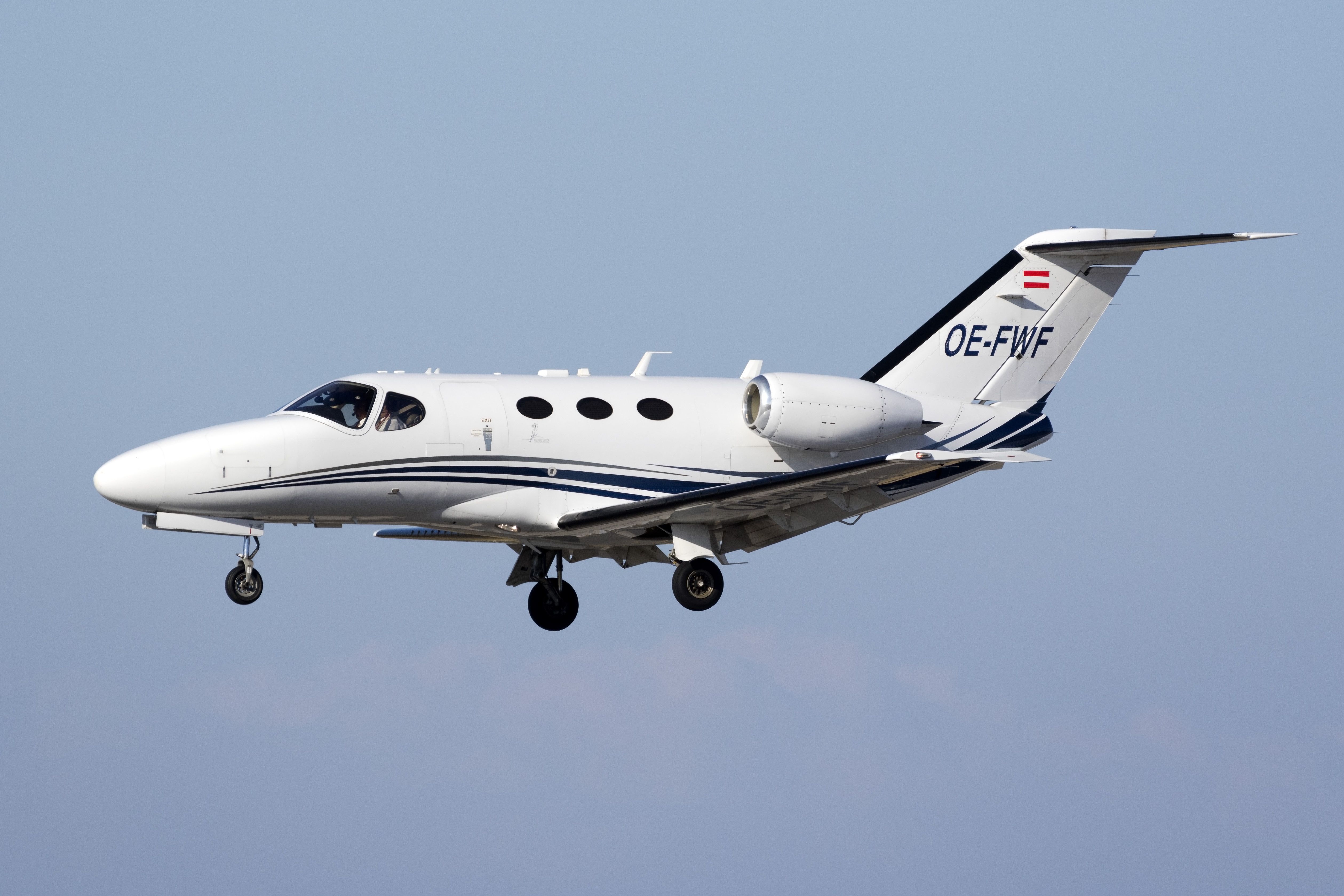 A private Cessna 510 Citation Mustang (OE-FWF) on finals for runway 31