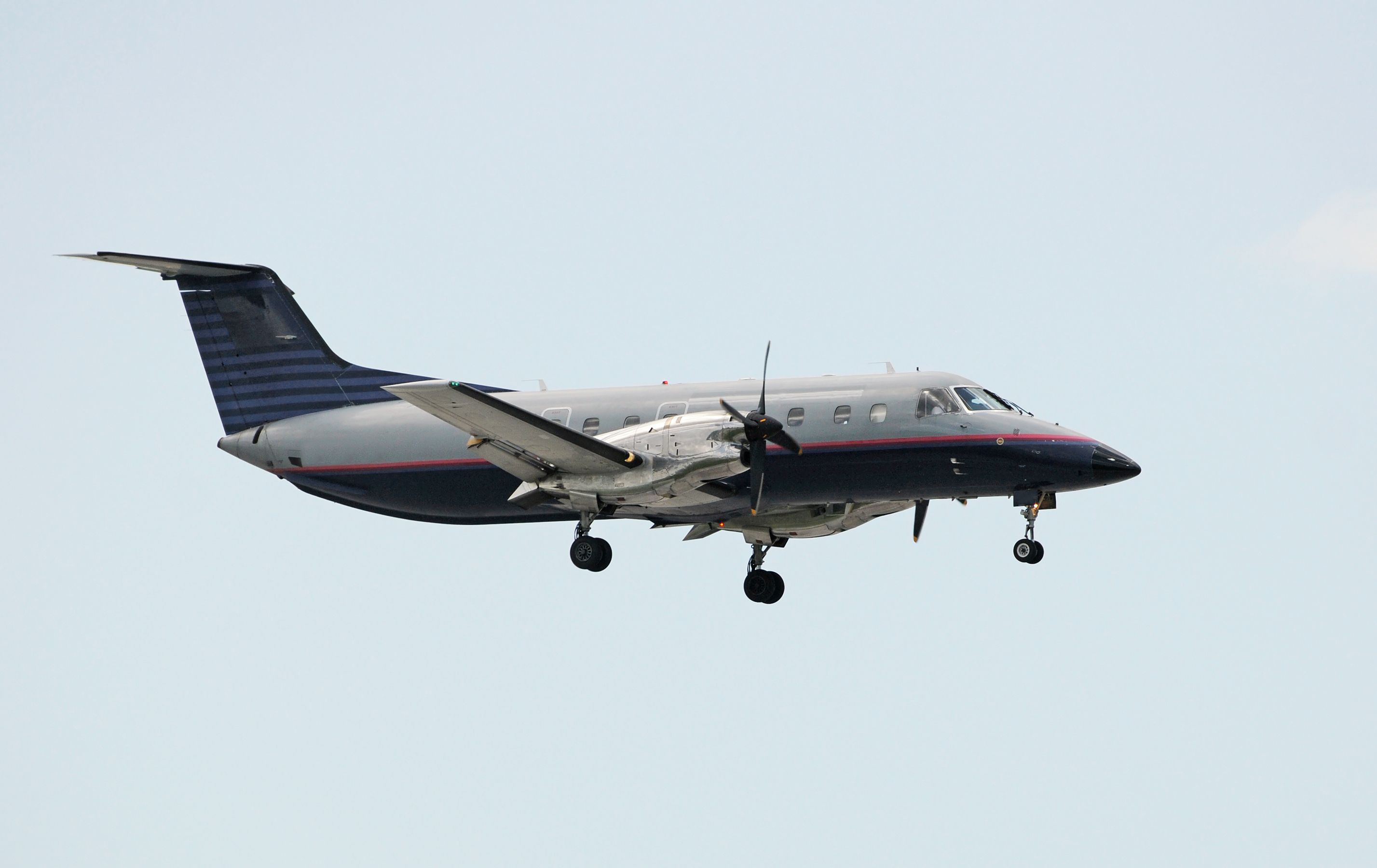 A Turboprop airplane flying in the sky.