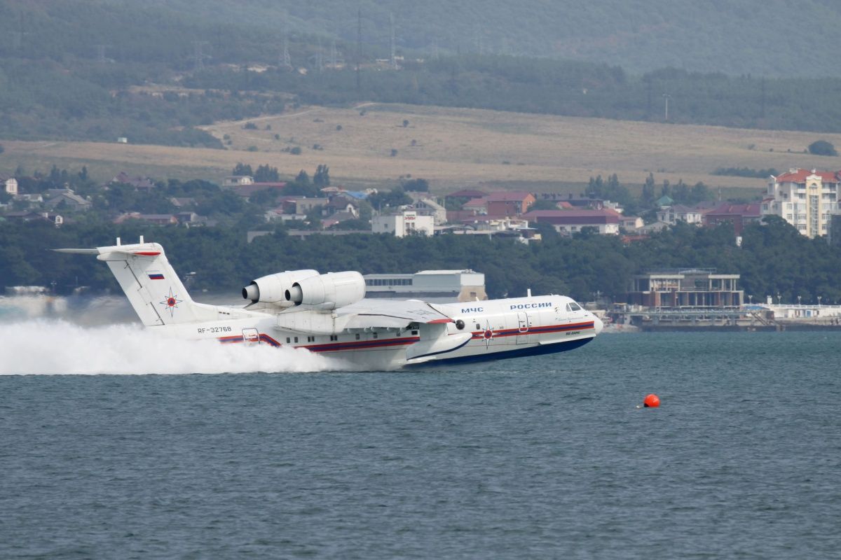 Beriev Be-200 amphibian cargo and firefighter plane is taking off from the water surface