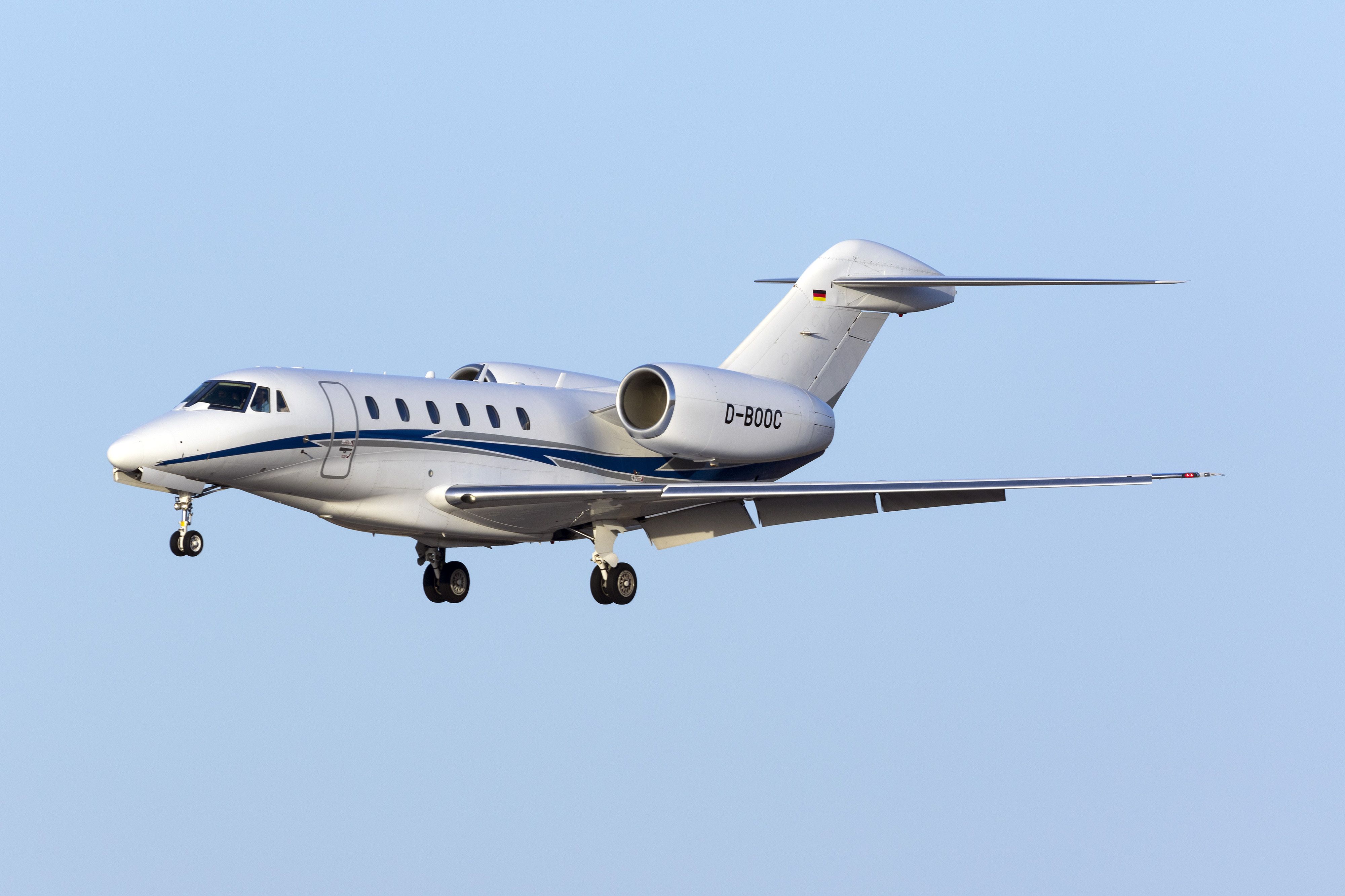 A Cessna Citation X flying in the sky.