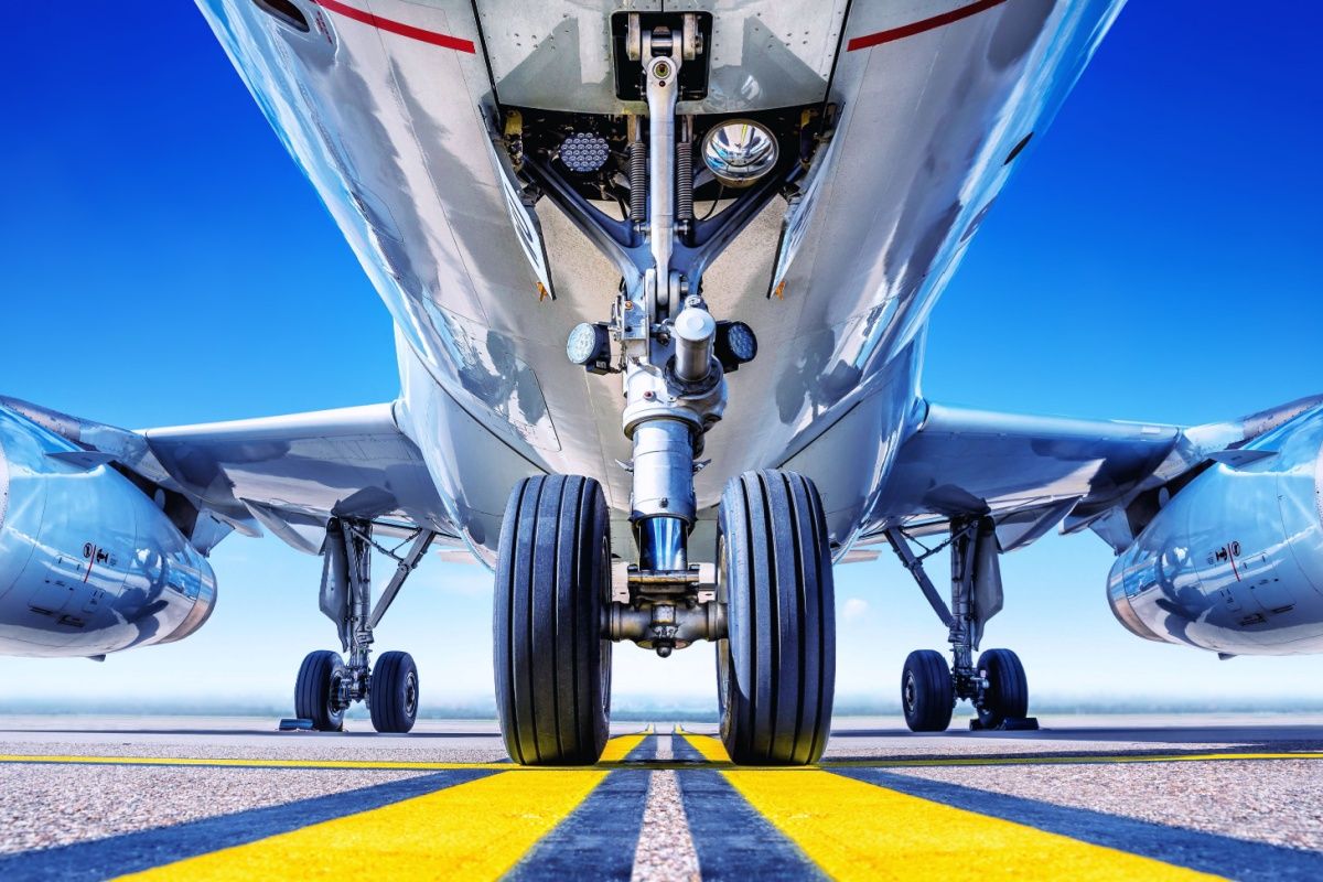 A closeup photo of the landing gear on an aircraft.