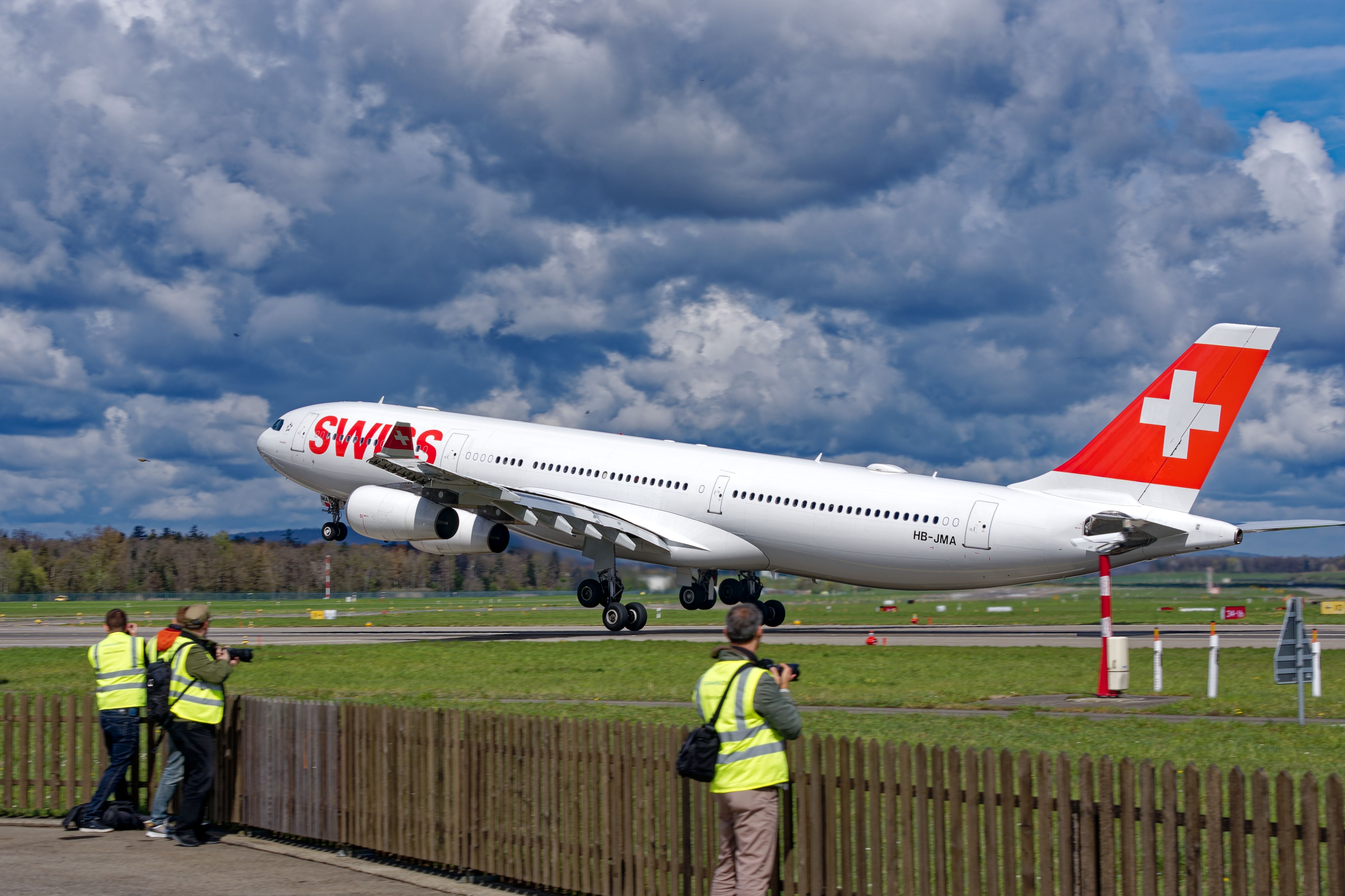 SWISS Airbus A340-300 taking off from Zurich Airport ZRH shutterstock_2289876367