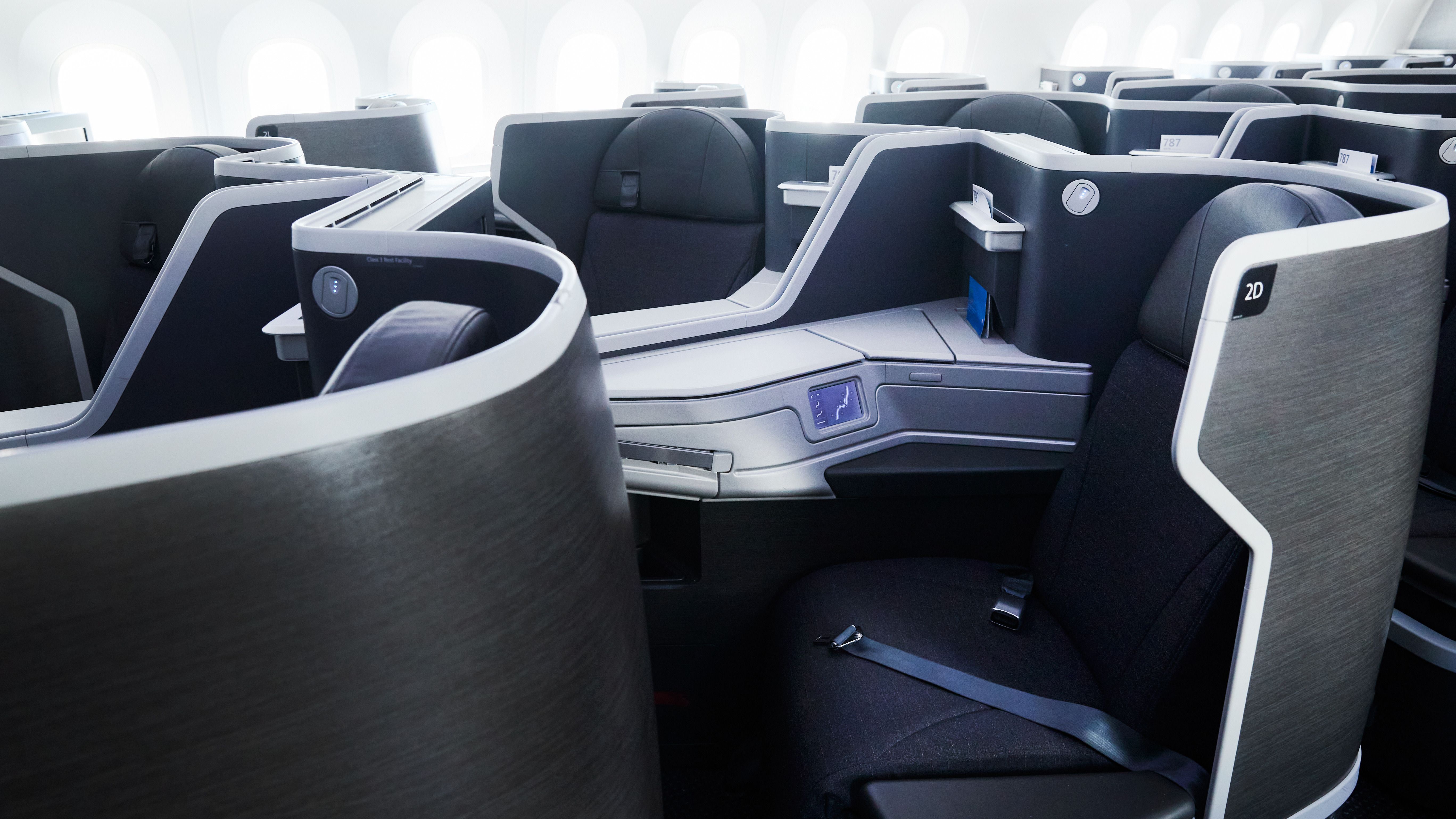 Several Seats of an American Airlines widebody aircraft Flagship Business cabin.