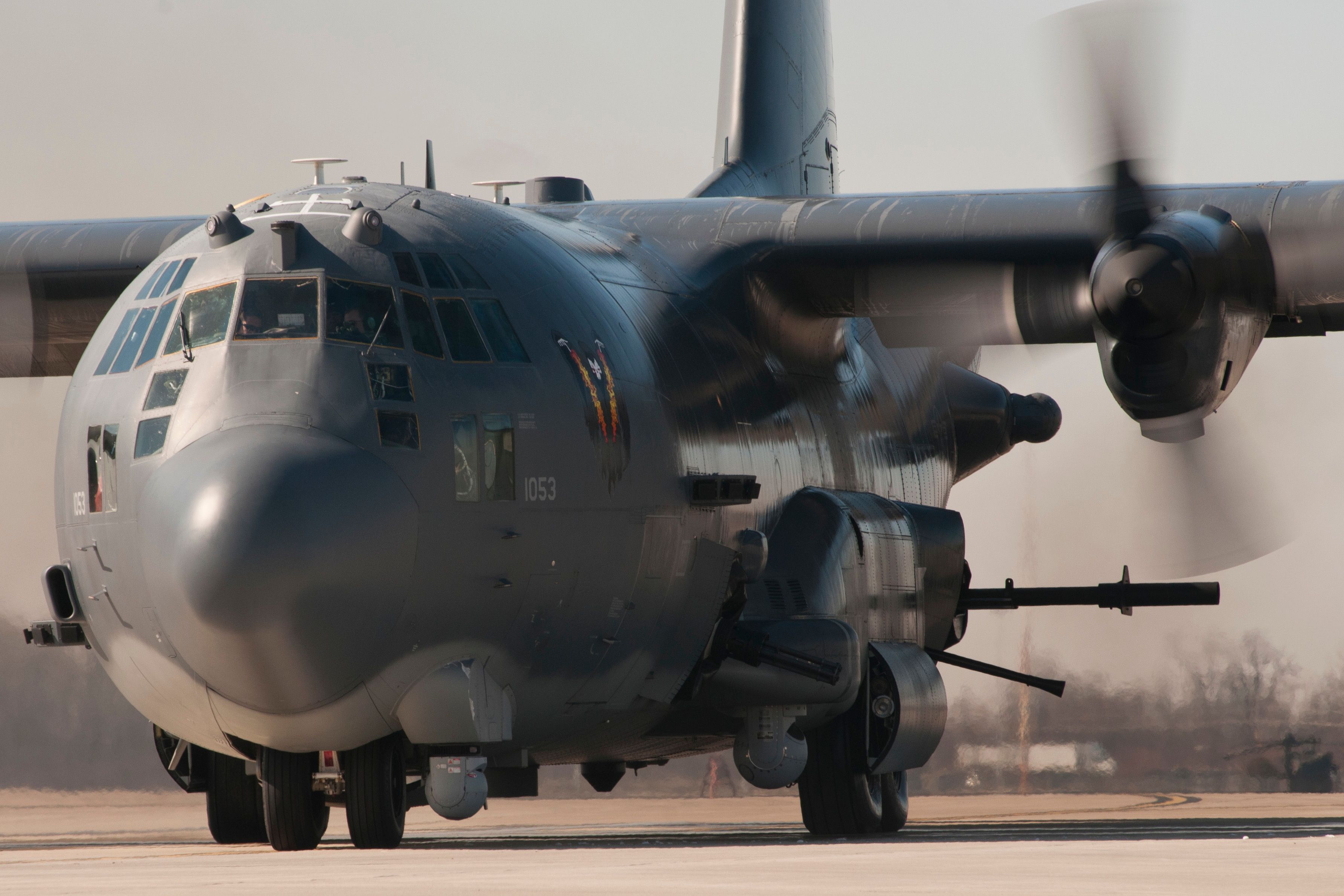 A Lockheed AC-130 on an airfield apron.