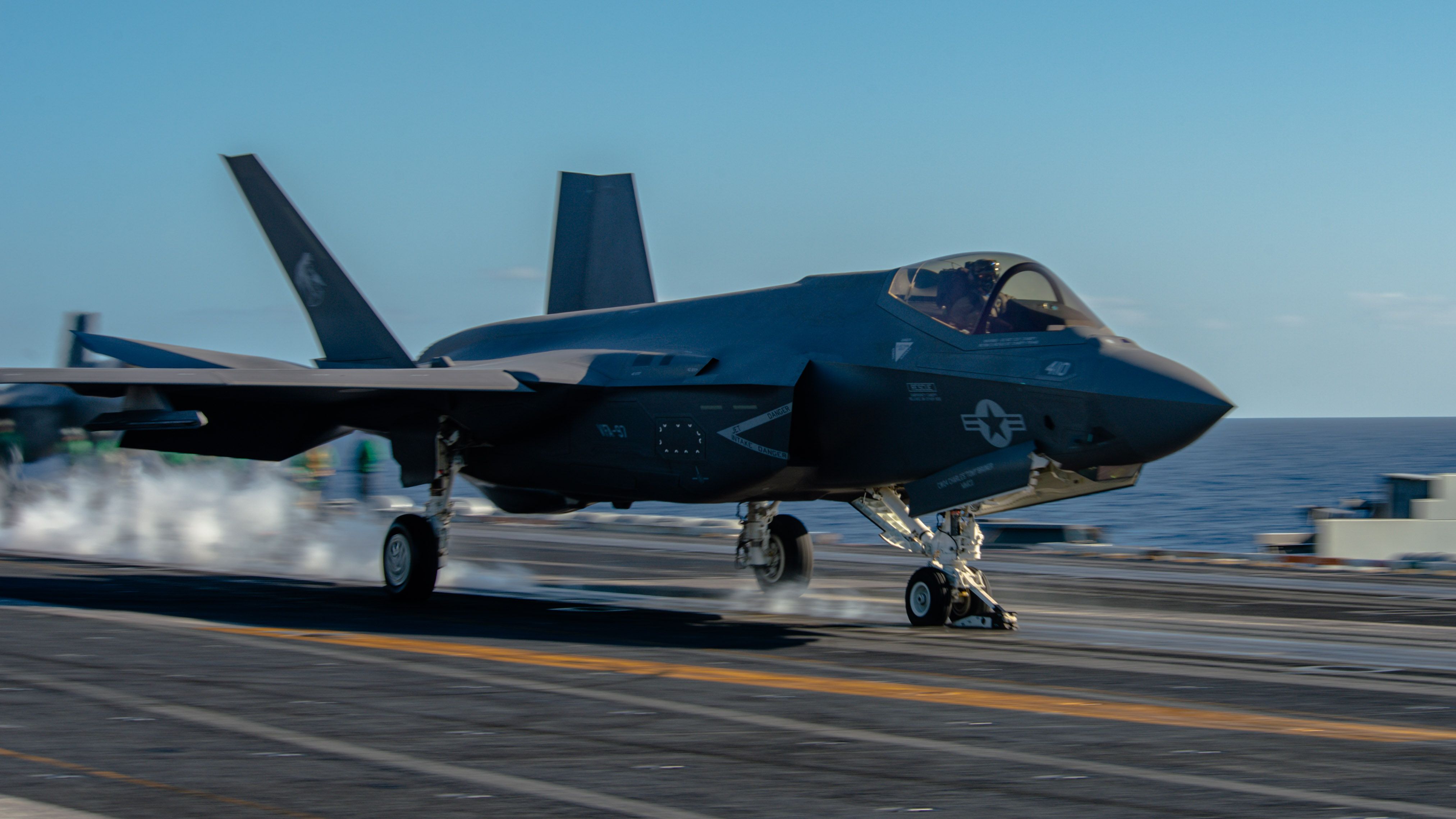 An F-35C Lightning II from the "Warhawks" of Strike Fighter Squadron (VFA) 97 launches off the flight deck of the Nimitz-class aircraft carrier USS Theodore Roosevelt 