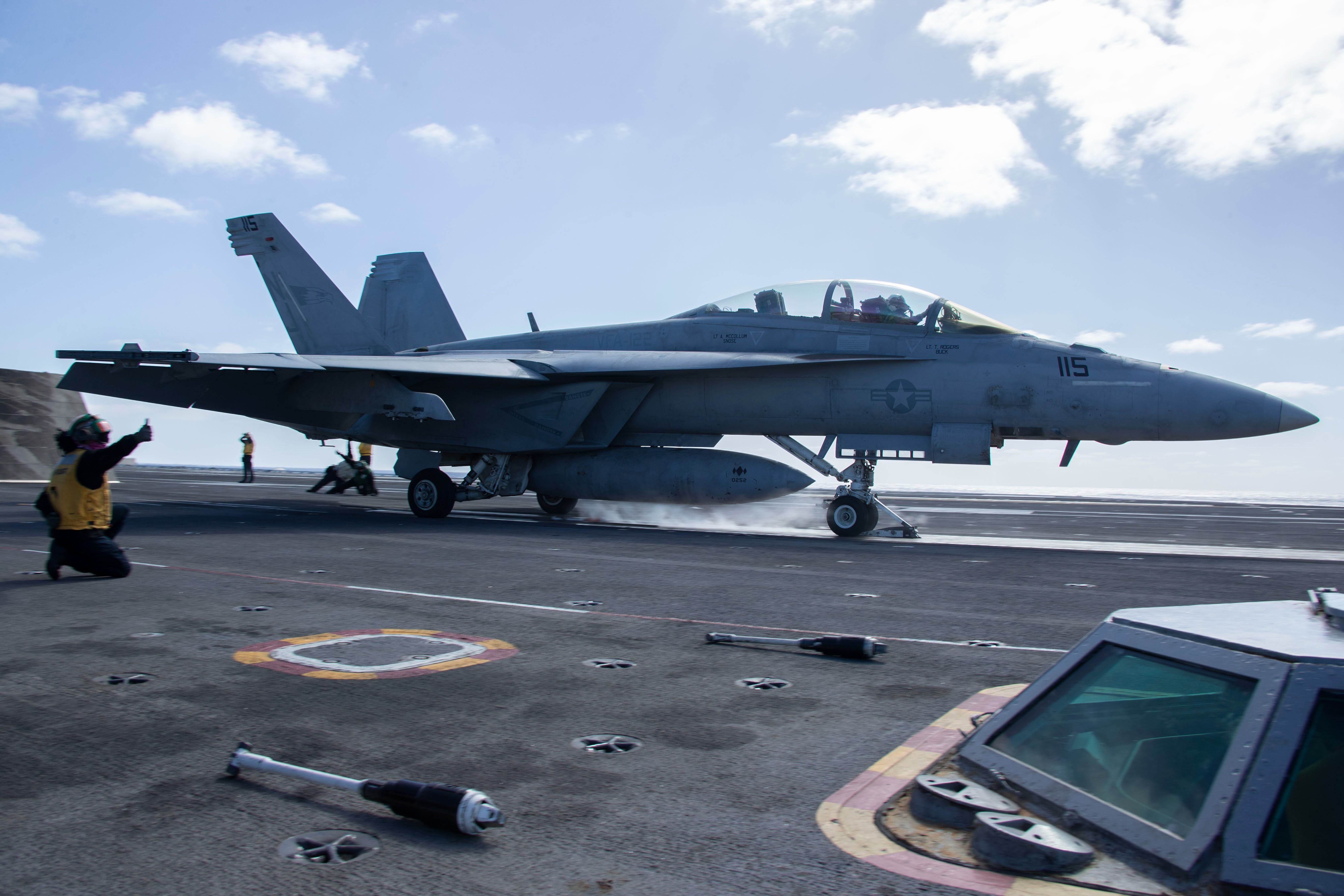 An F/A-18E Super Hornet assigned to Strike Fighter Squadron (VFA) 122 prepares to launch from the flight deck of the Nimitz-class aircraft carrier USS Abraham Lincoln (CVN 72).