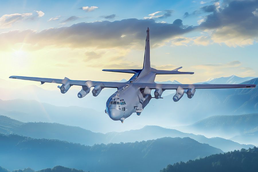 A Lockheed AC-130 flying in the sky.